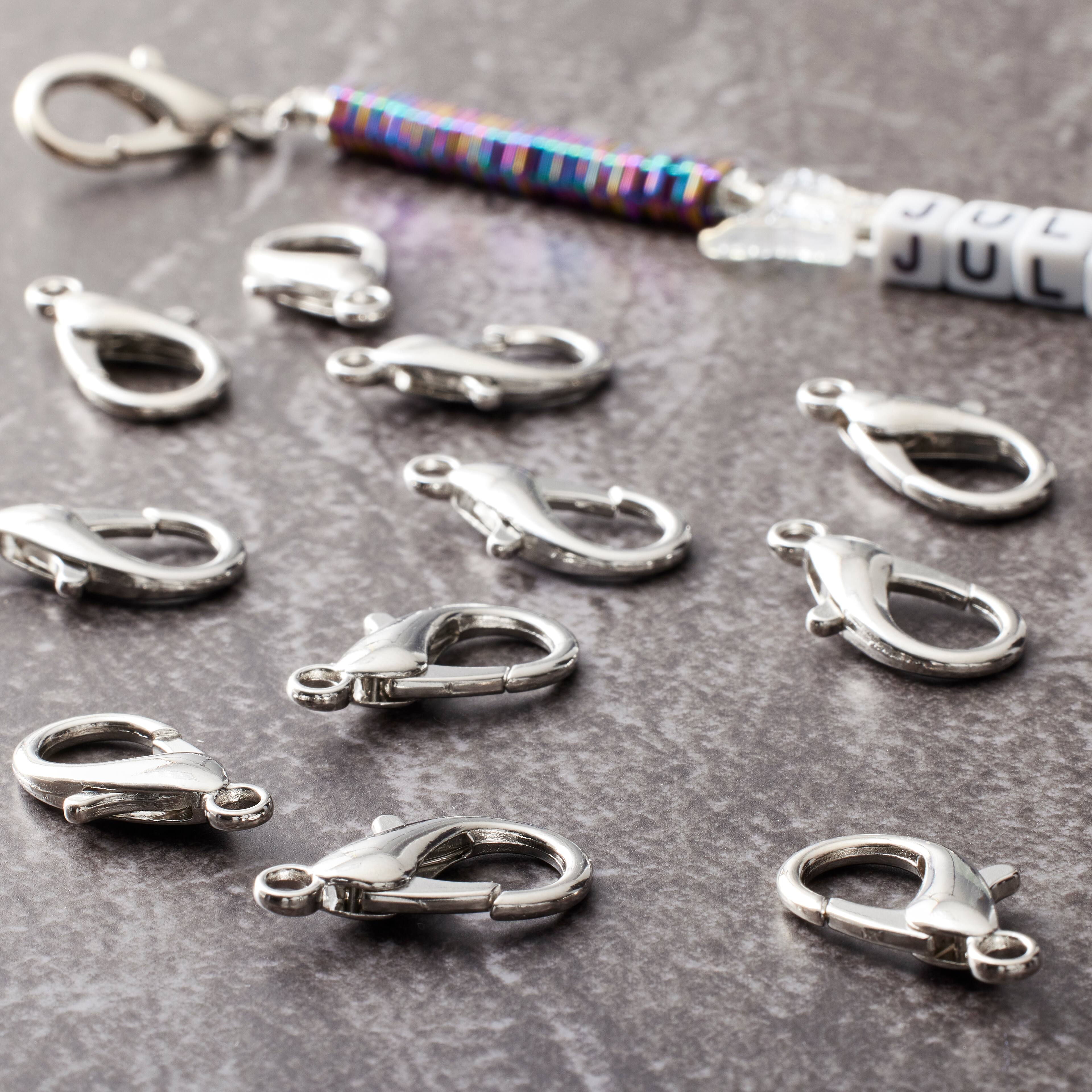 12 Pack: Rhodium Lobster Claw Clasp, 23mm by Bead Landing™
