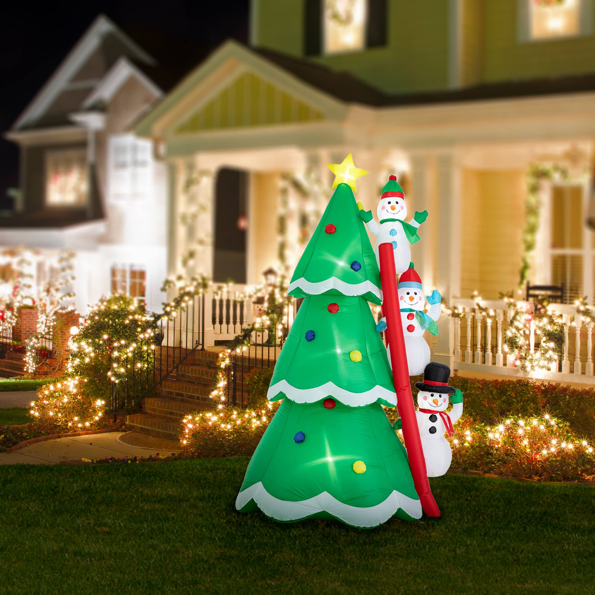 Glitzhome® 8ft. Lighted Inflatable Xmas Snowman Climbing Up Tree Décor
