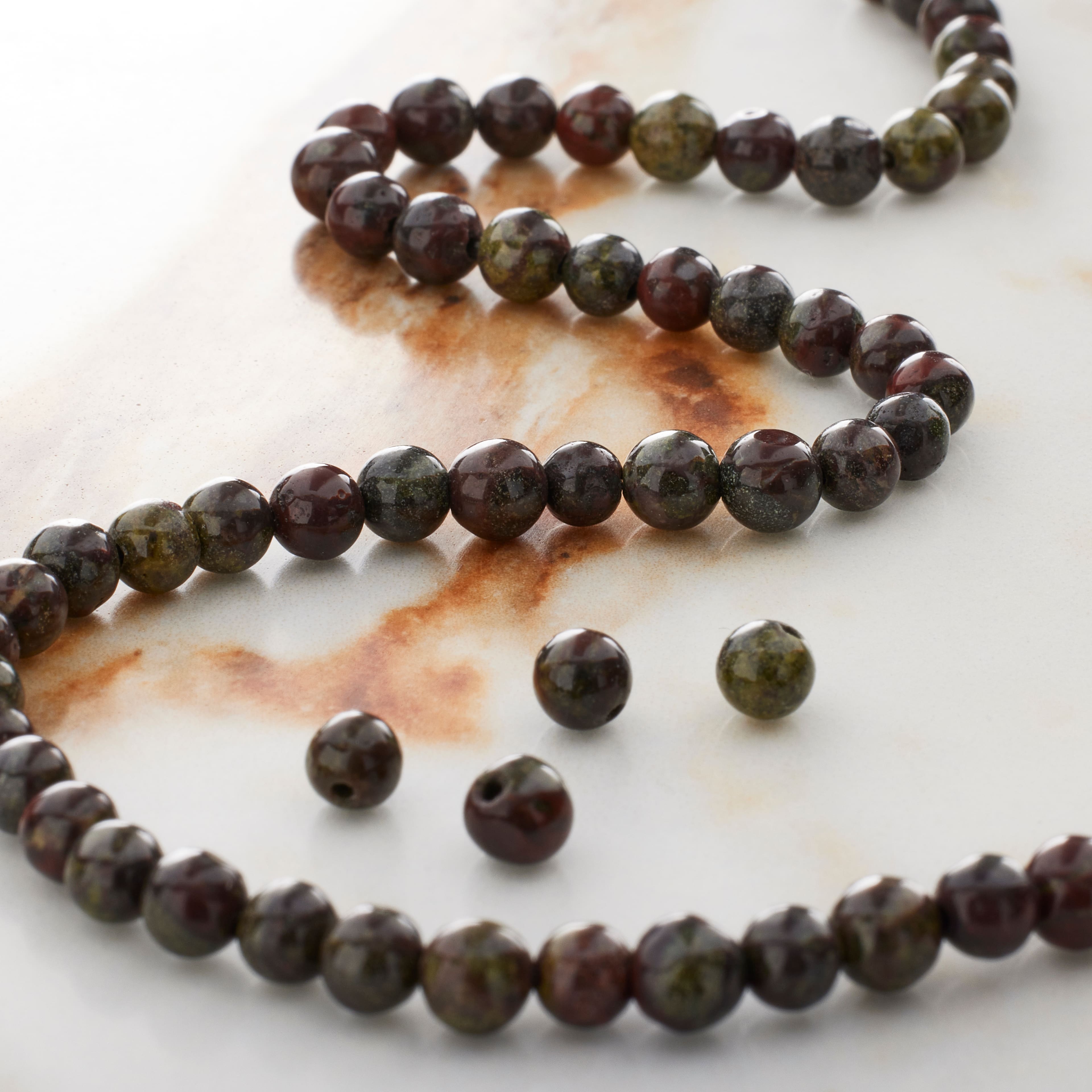 12 Pack: Dark Green & Red Dragon Blood Round Beads by Bead Landing