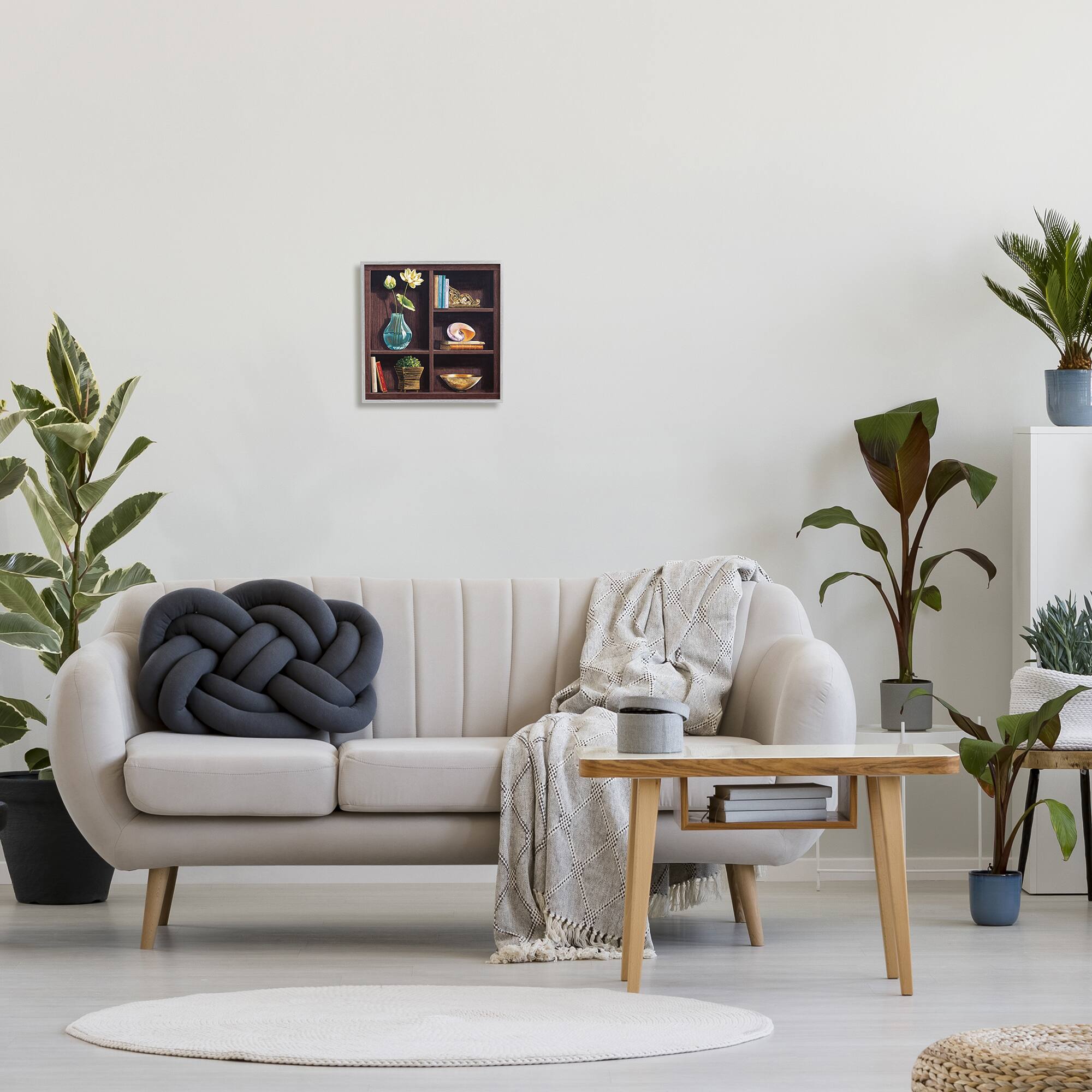 Stupell Industries Elegant Bookshelf Still-Life with Lotus Floral Vase in Frame Wall Art