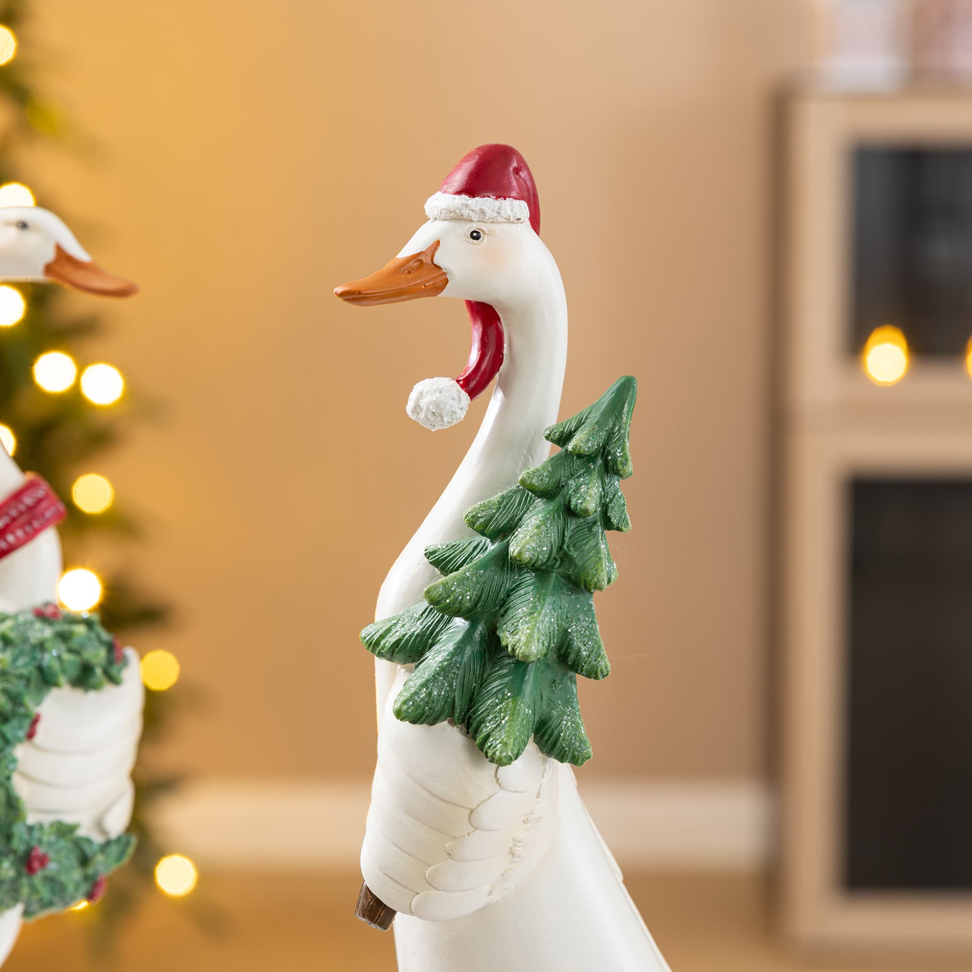 Glitzhome® Set of 2 Christmas Resin Goose with Wreath and Tree Table Decor