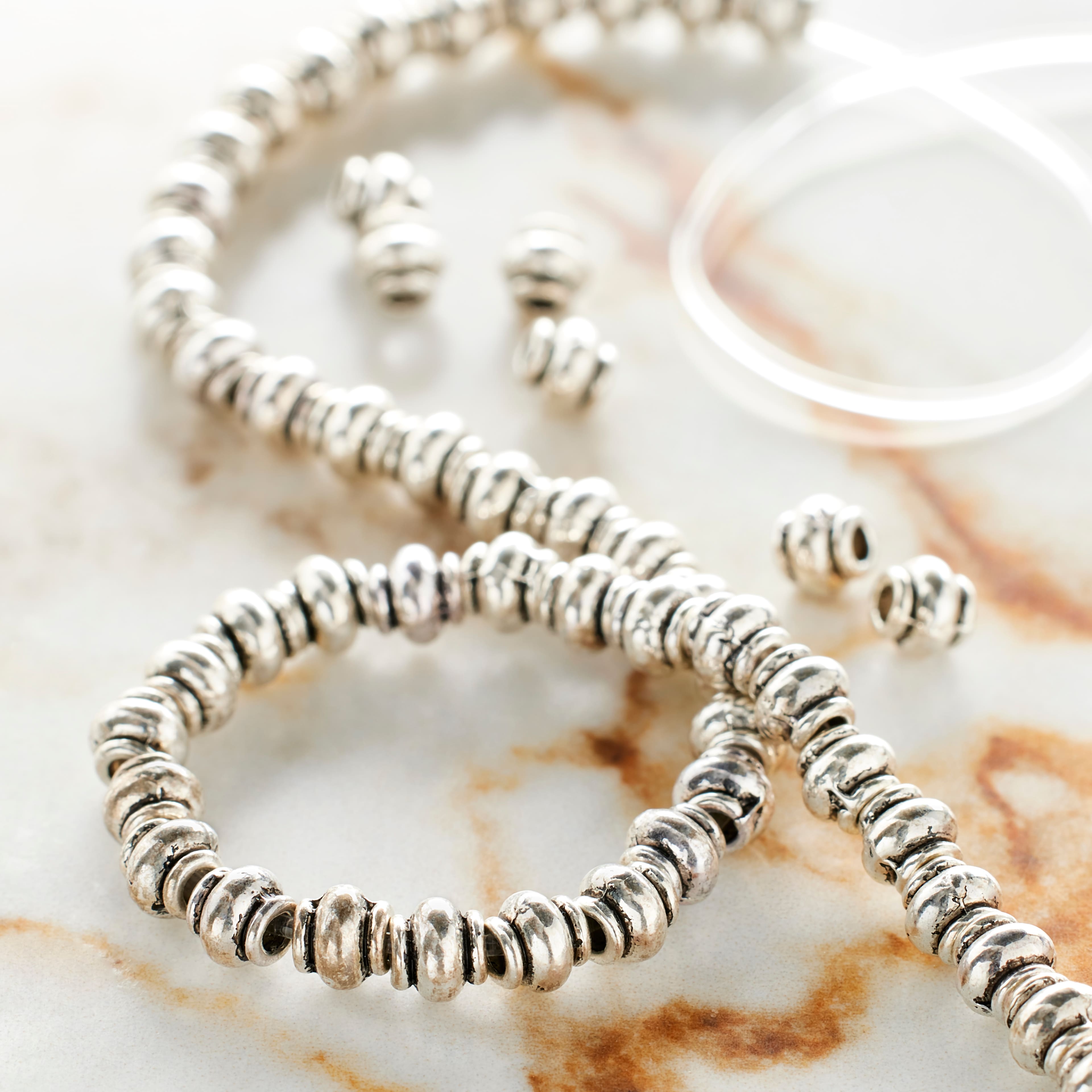 12 Pack: Silver Plated Smooth Rondelle Beads, 4mm by Bead Landing™