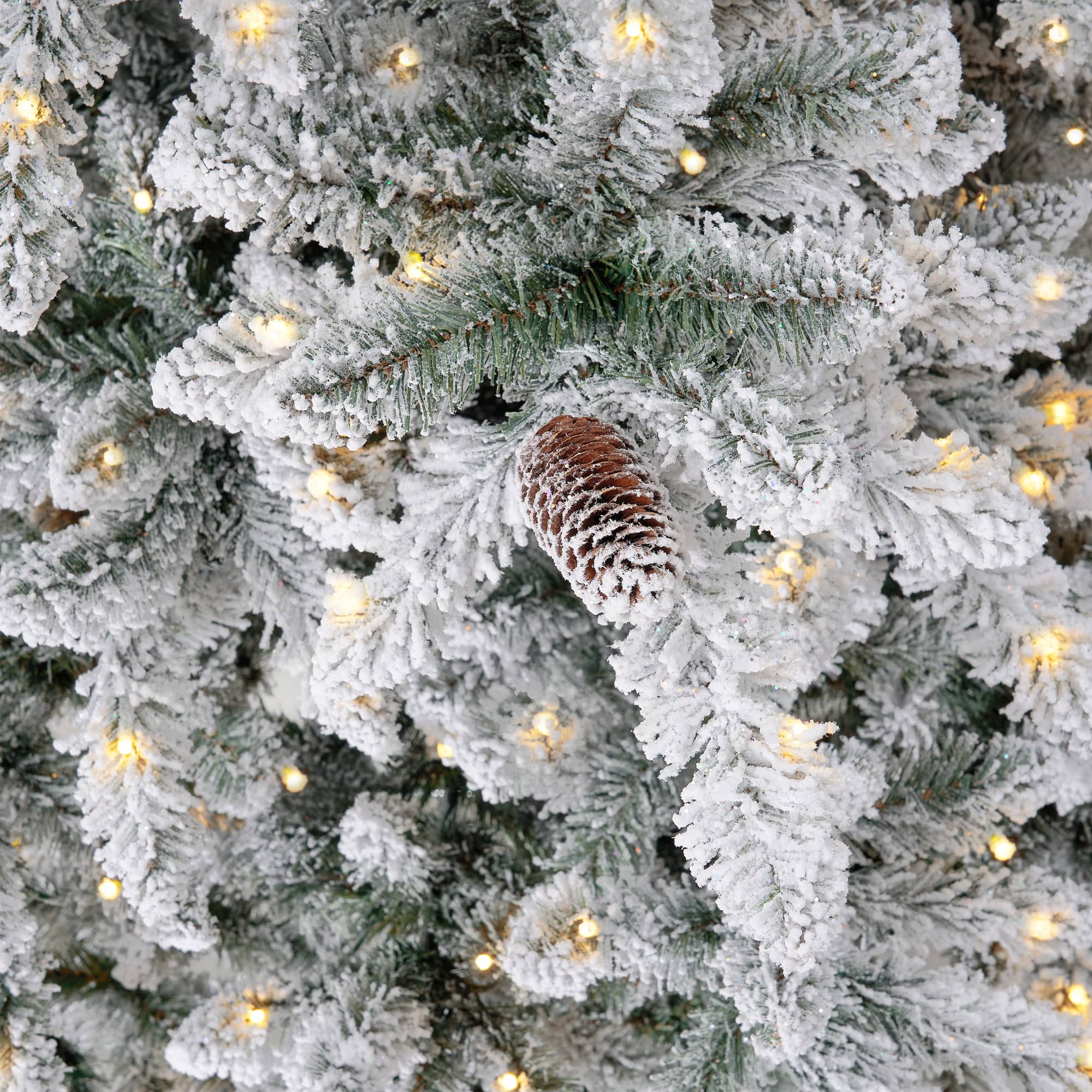 11ft. Pre-Lit Flocked Livingston Fir Artificial Christmas Tree with Pine Cones, Clear LED Lights