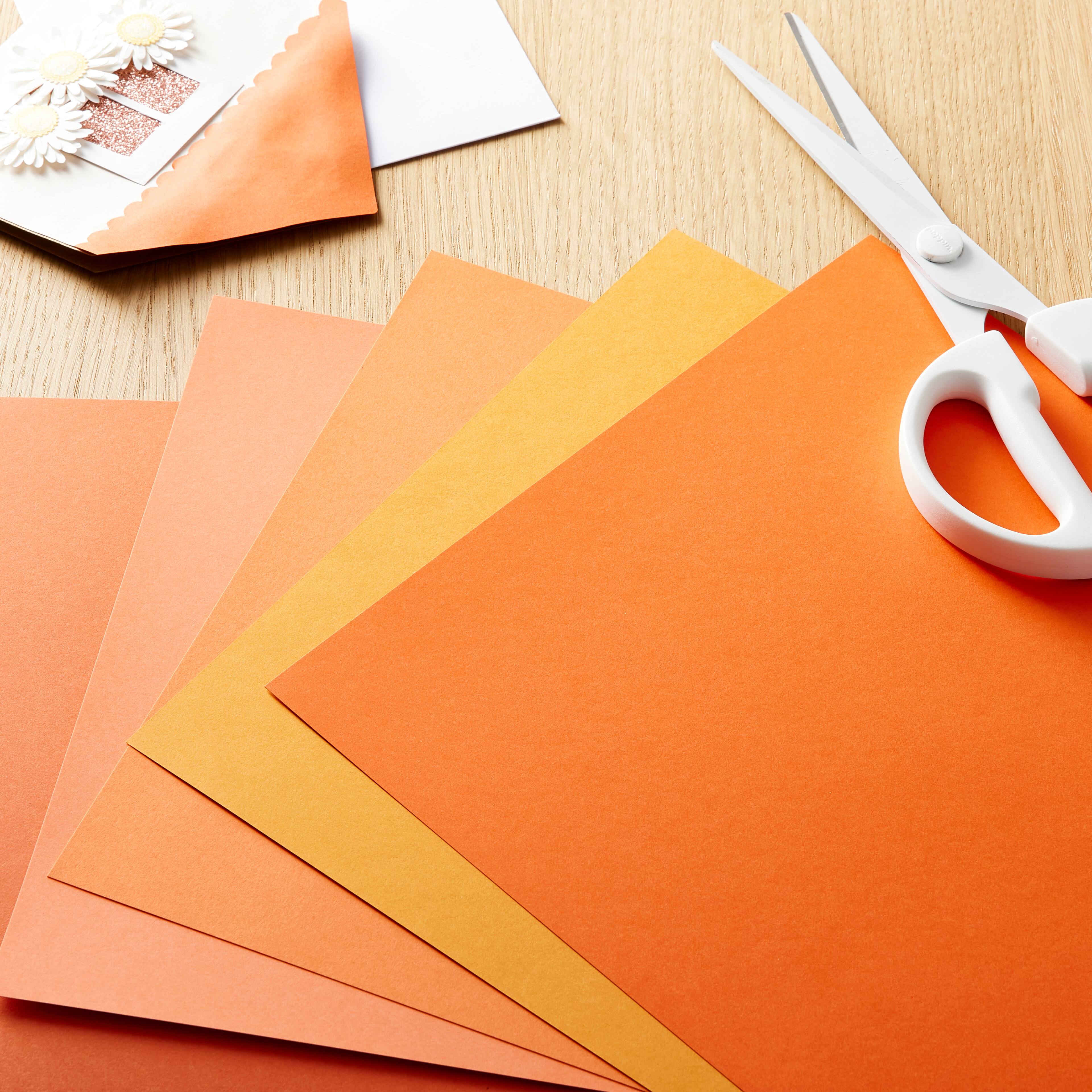 12 Packs: 50 ct. (600 total) Tangerine 8.5" x 11" Cardstock Paper by Recollections™