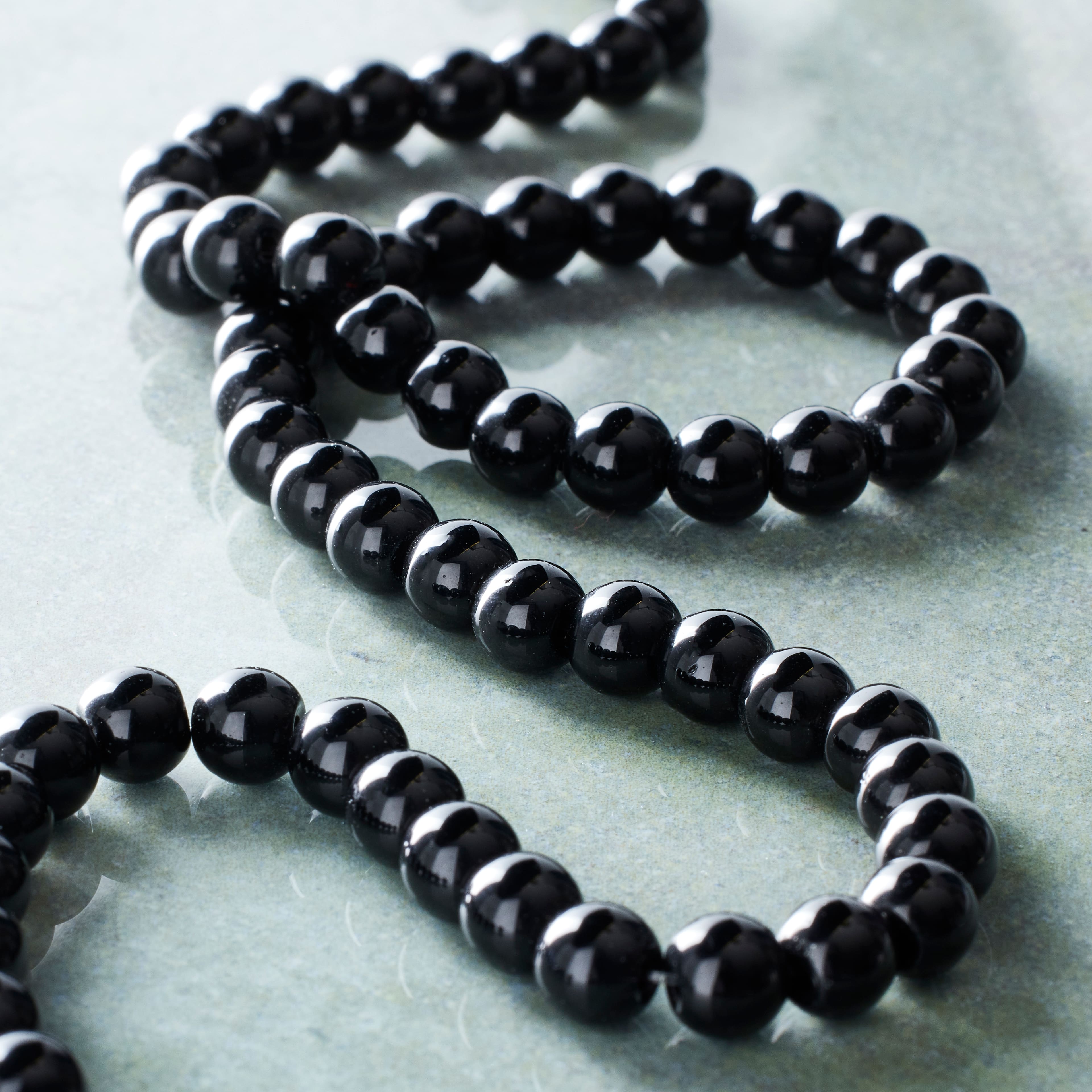 9 Packs: 68 ct. (612 total) 6mm Glass Round Beads by Bead Landing™