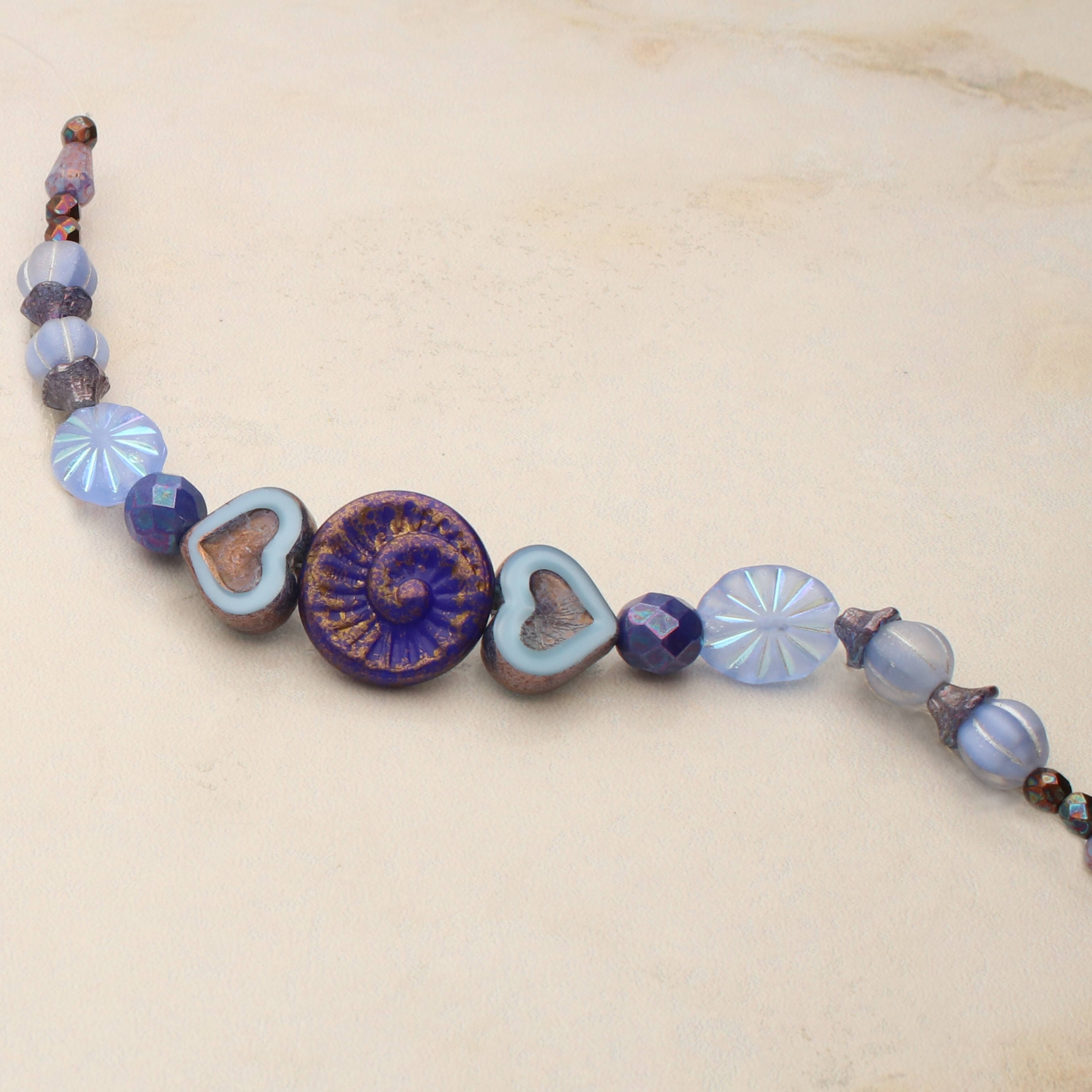 6 Packs: 23 ct. (138 total) Blue Heart Czech Glass Beads by Bead Landing™