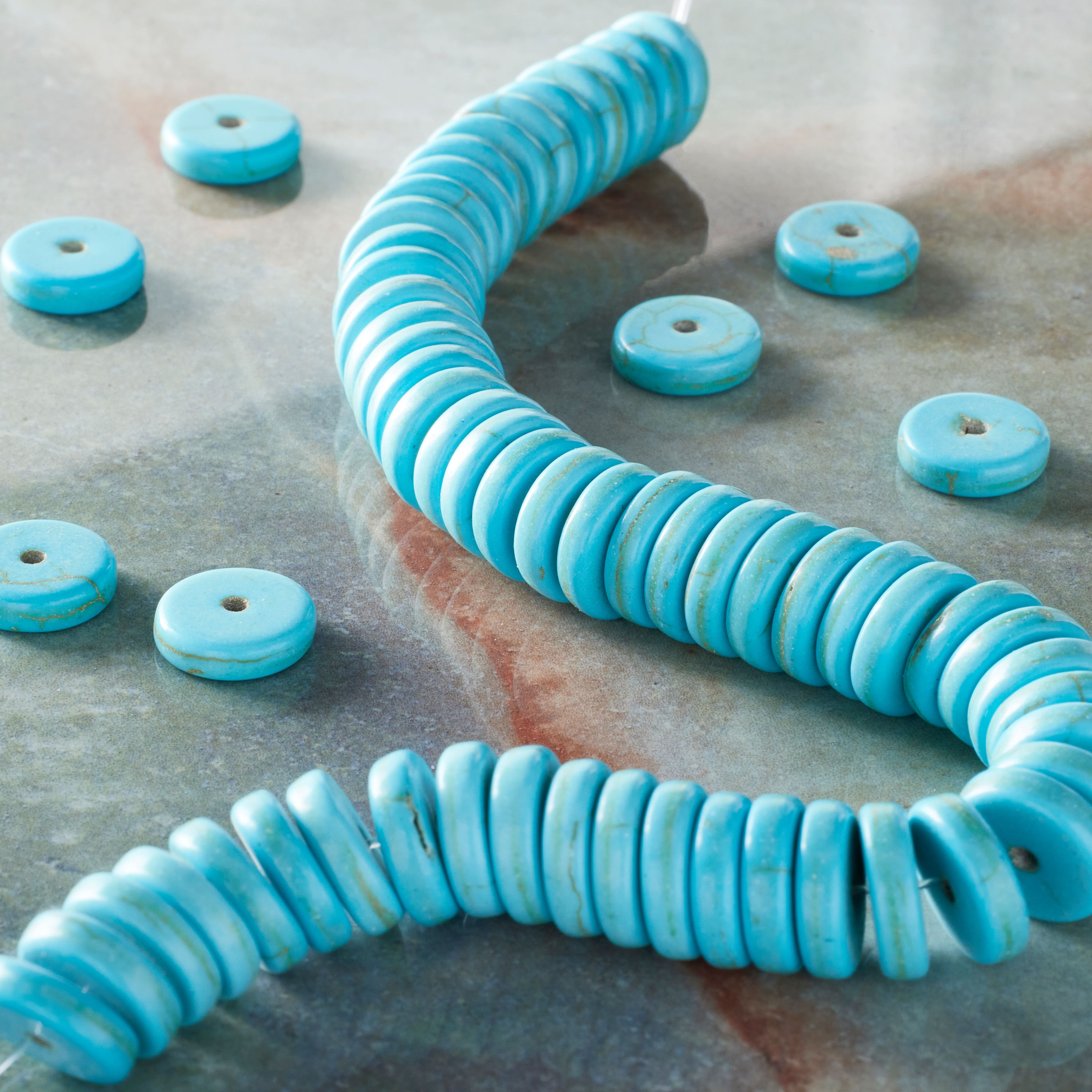 12 Pack: Turquoise Reconstituted Howlite Heishi Beads, 10mm by Bead Landing™