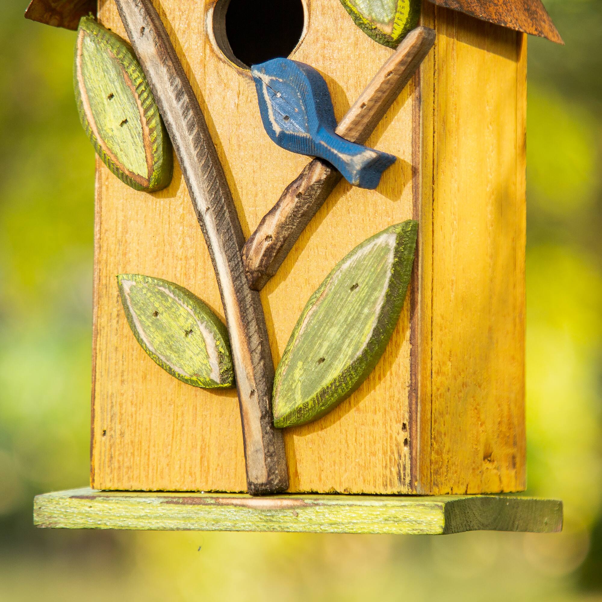 Glitzhome® 9.75" Yellow Distressed Bird & Tree Birdhouse