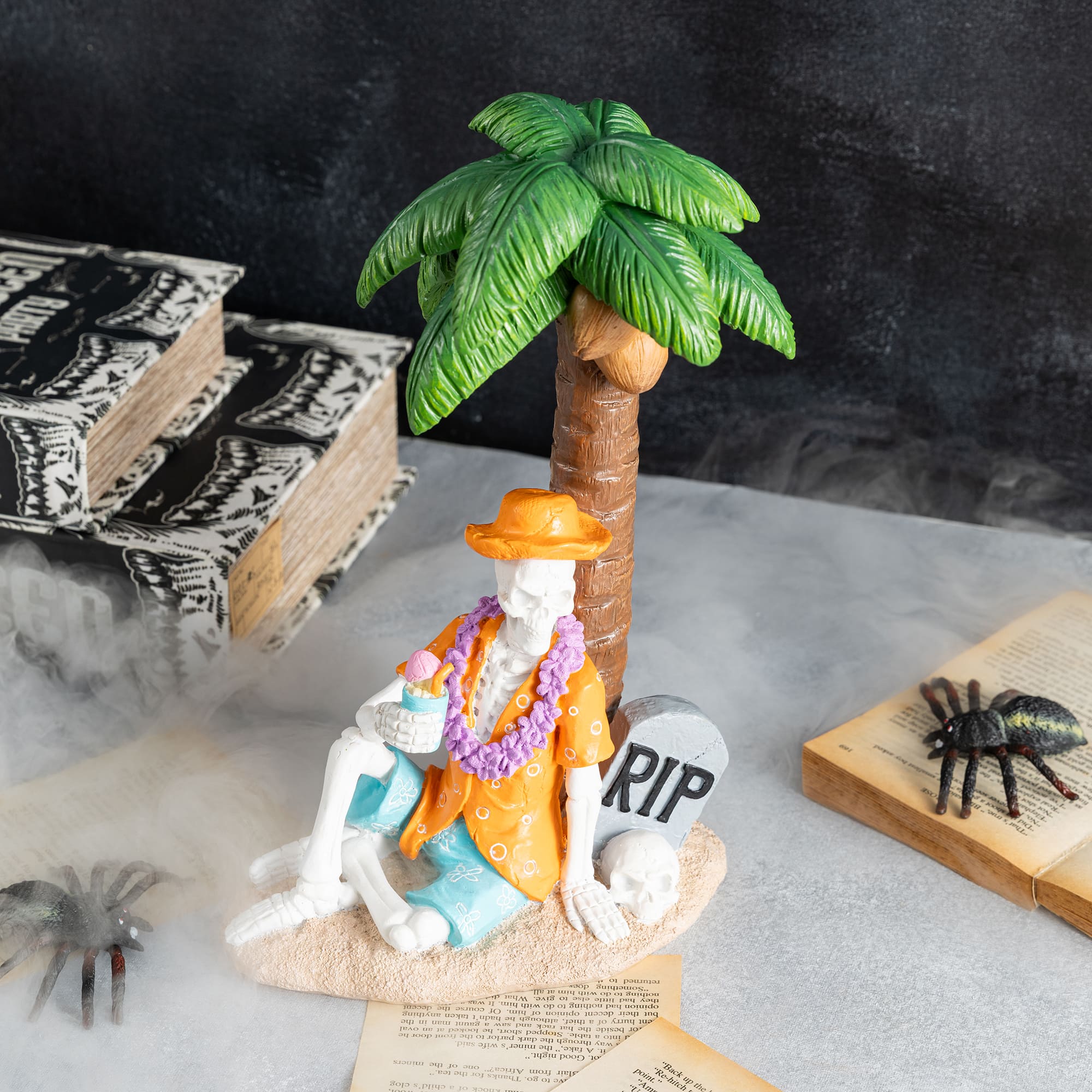Glitzhome® 11.5" Halloween Polyresin Skeleton on Beach Table Decor