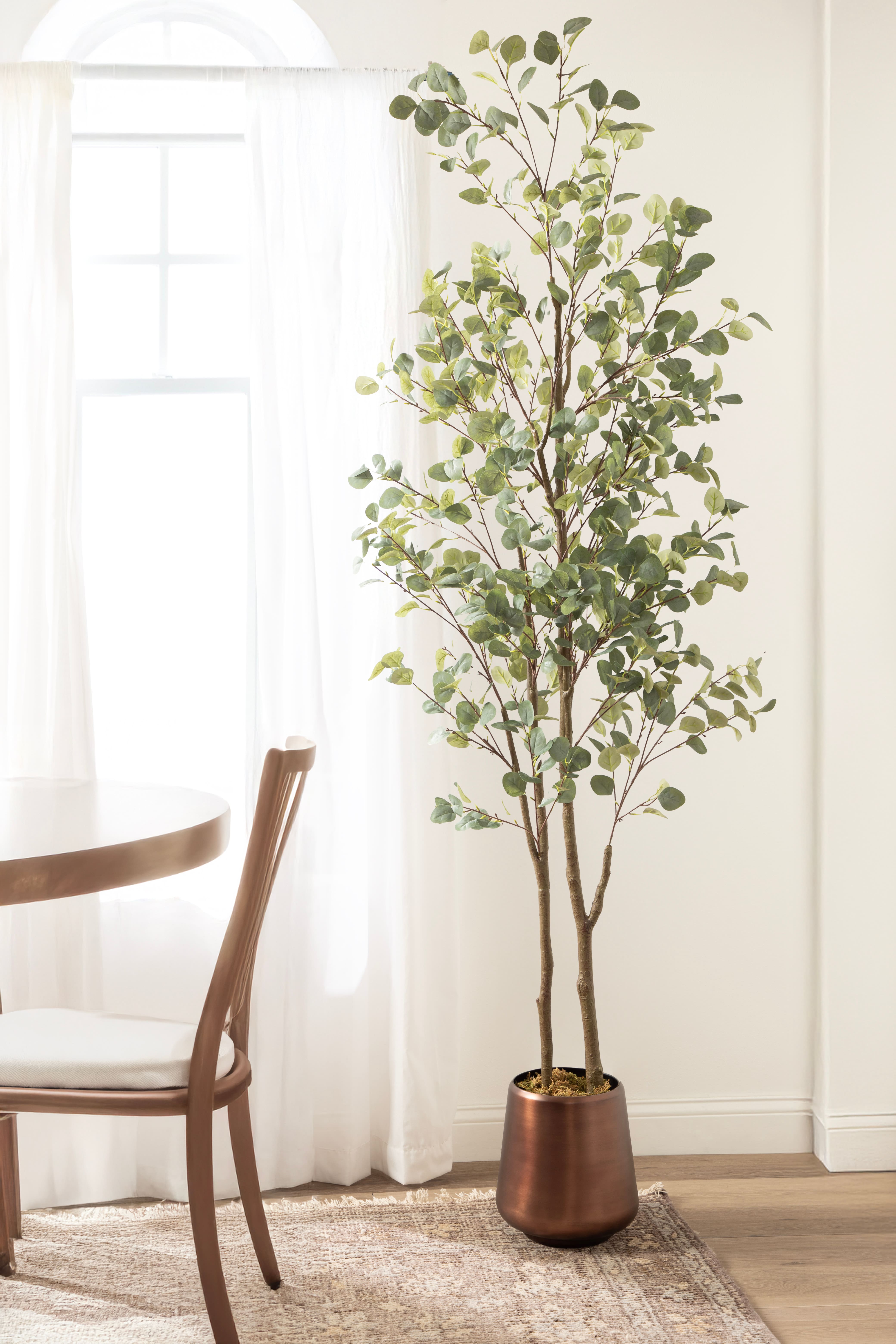 Kate and Laurel 8ft. Eudora Faux Eucalyptus Tree with Round Metal Planter