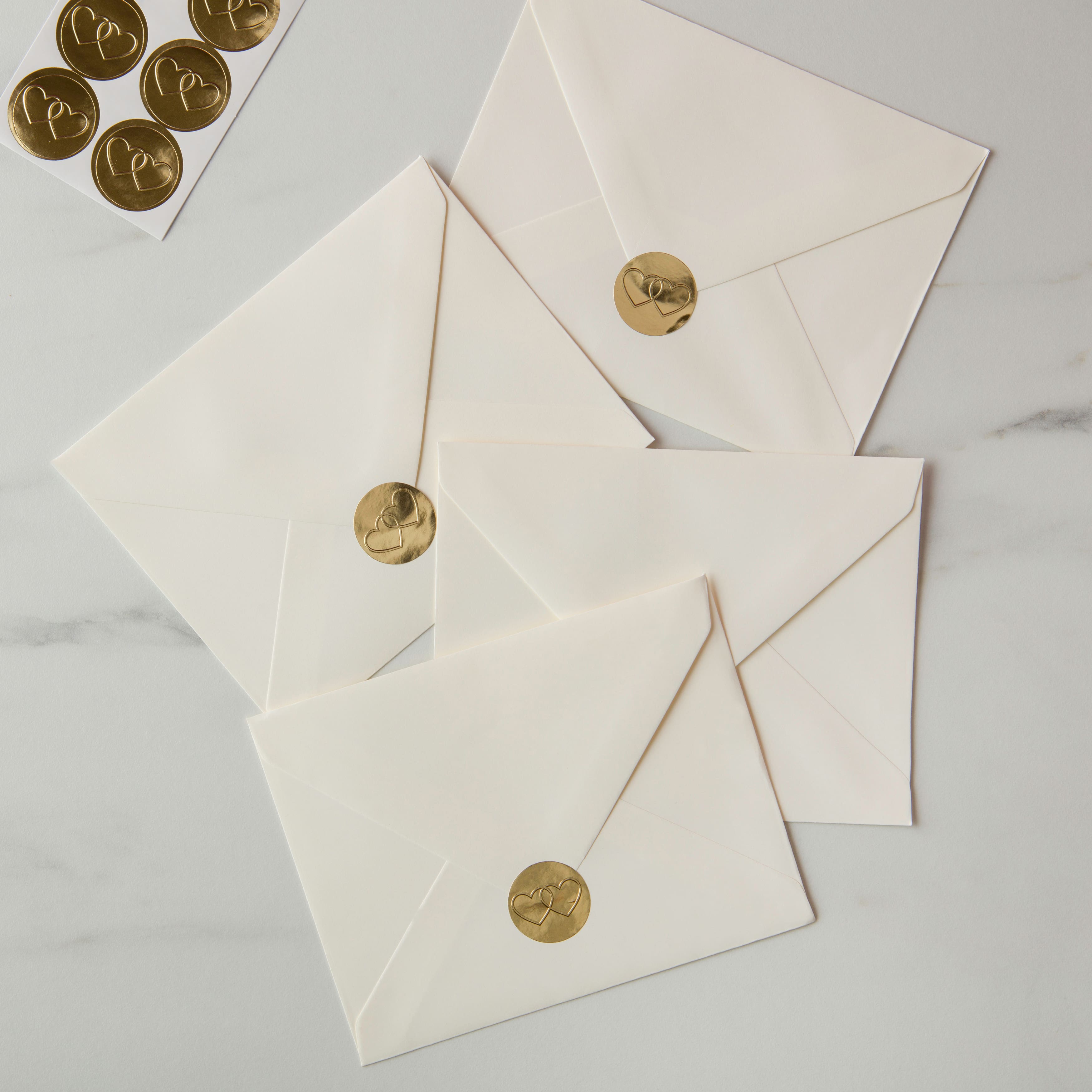 12 Packs: 50 ct. (600 total) 4.6" x 5.75" Ivory Envelopes Value Pack by Recollections™