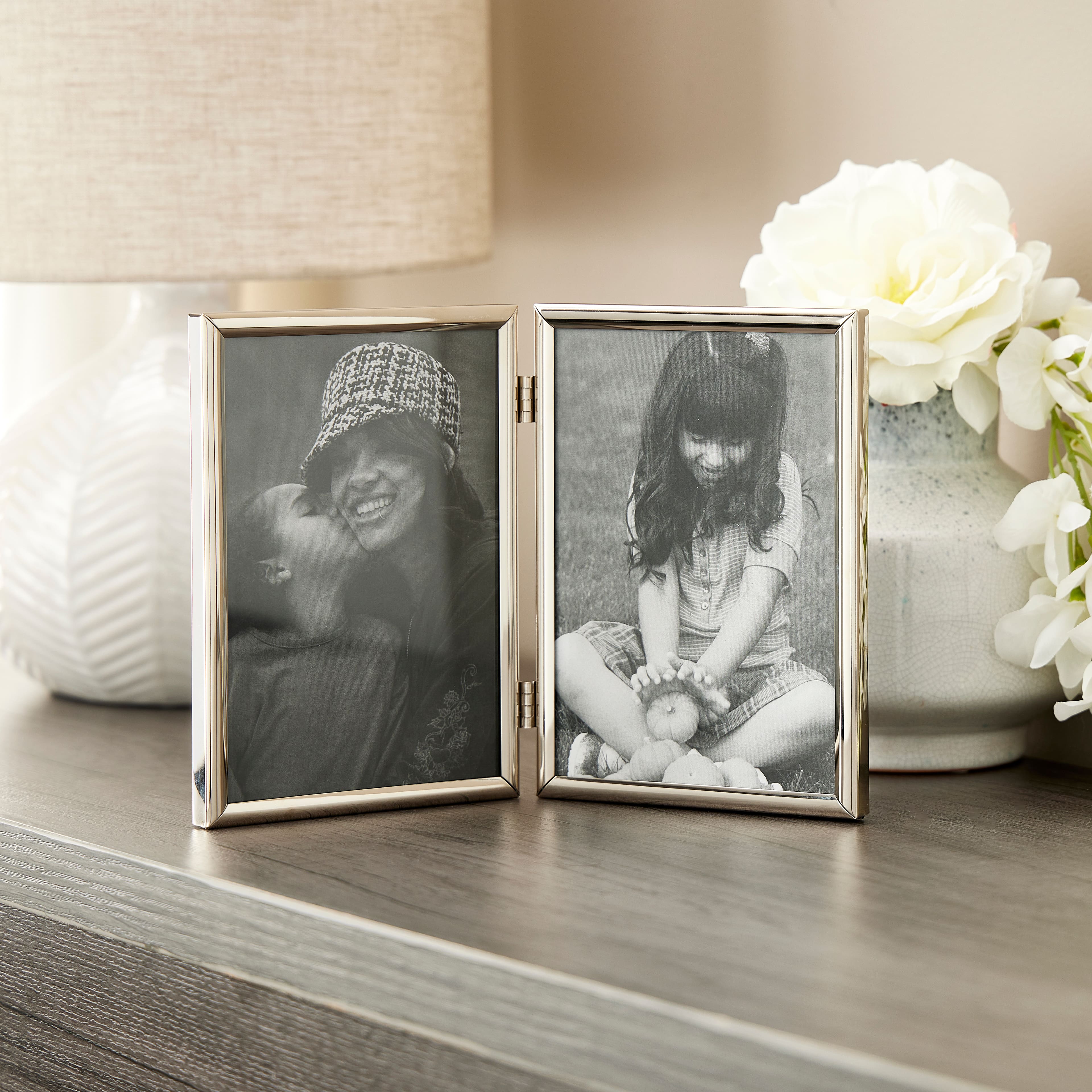 Simply Essentials™ 5" x 7" Polished Silver Hinged Frame by Studio Décor®