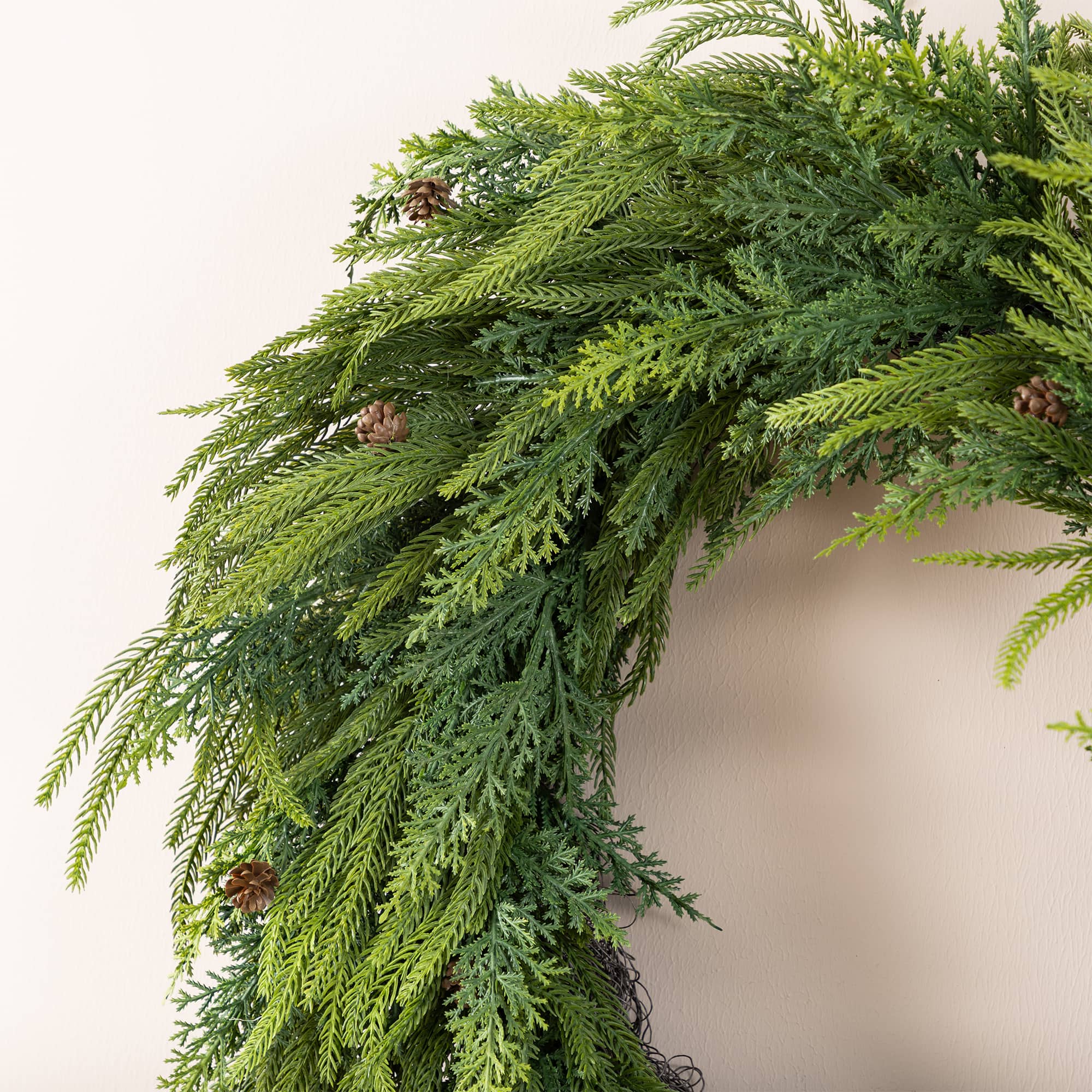 Glitzhome® 25.75" Christmas Greenery Mixed PE Wreath with Pinecones