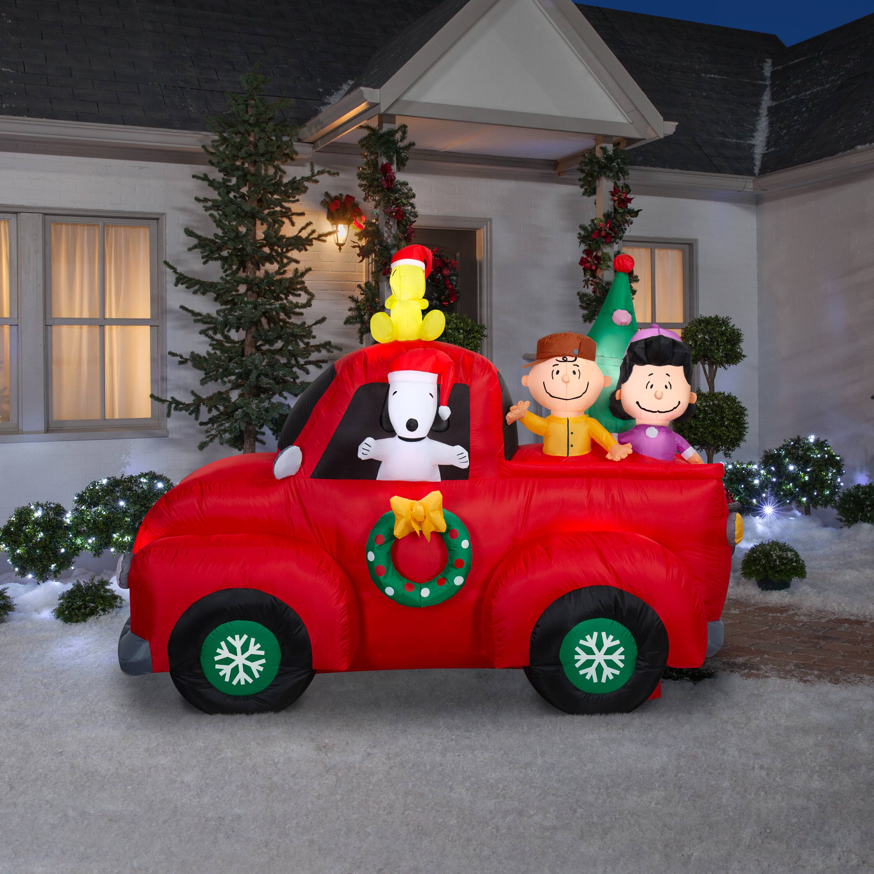 6ft. Airblown® Inflatable Peanuts® Snoopy Driving Truck with Friends Christmas Light Décor