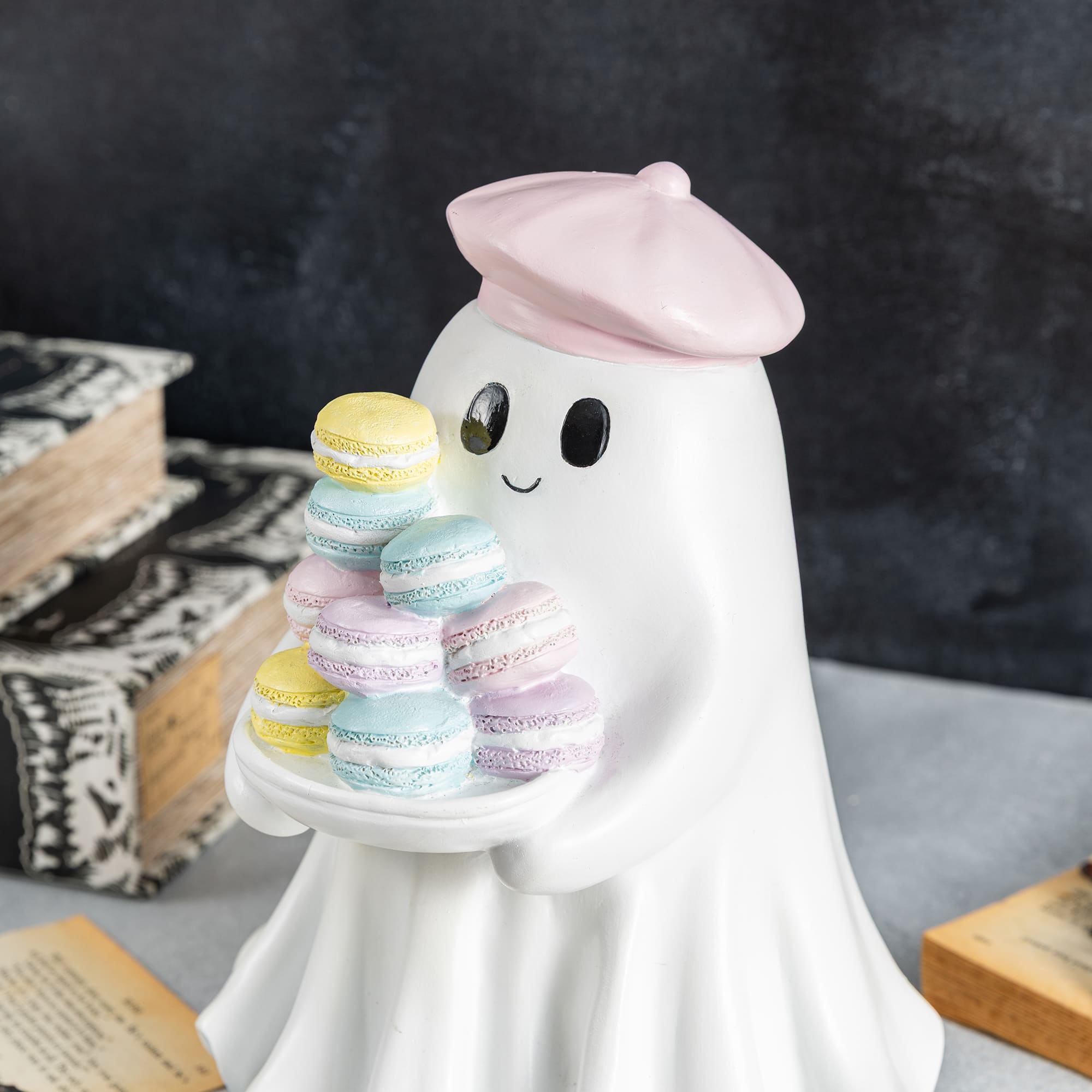 Glitzhome® 9.75" Halloween Polyresin Ghost with Macarons Table Decor