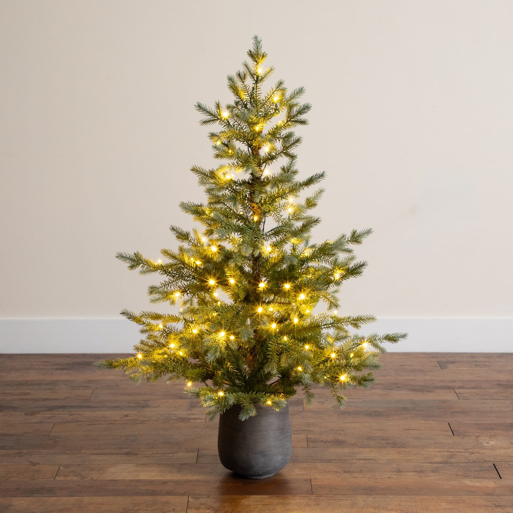 Nearly Natural 4ft. Pre-Lit Artificial Christmas Tree in Gray Ceramic Planter