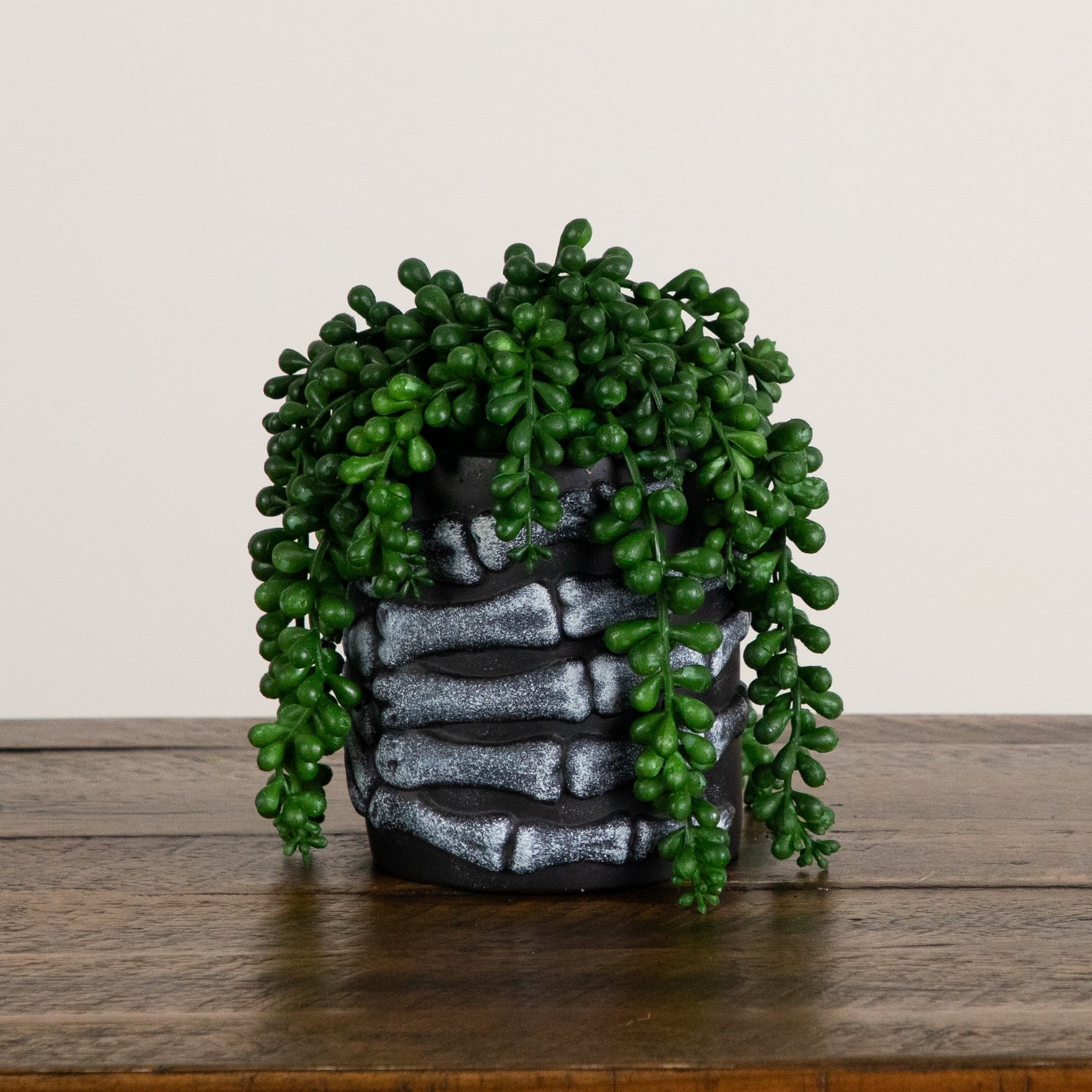7" Artificial Halloween String of Pearls in Skeleton Hand Planter
