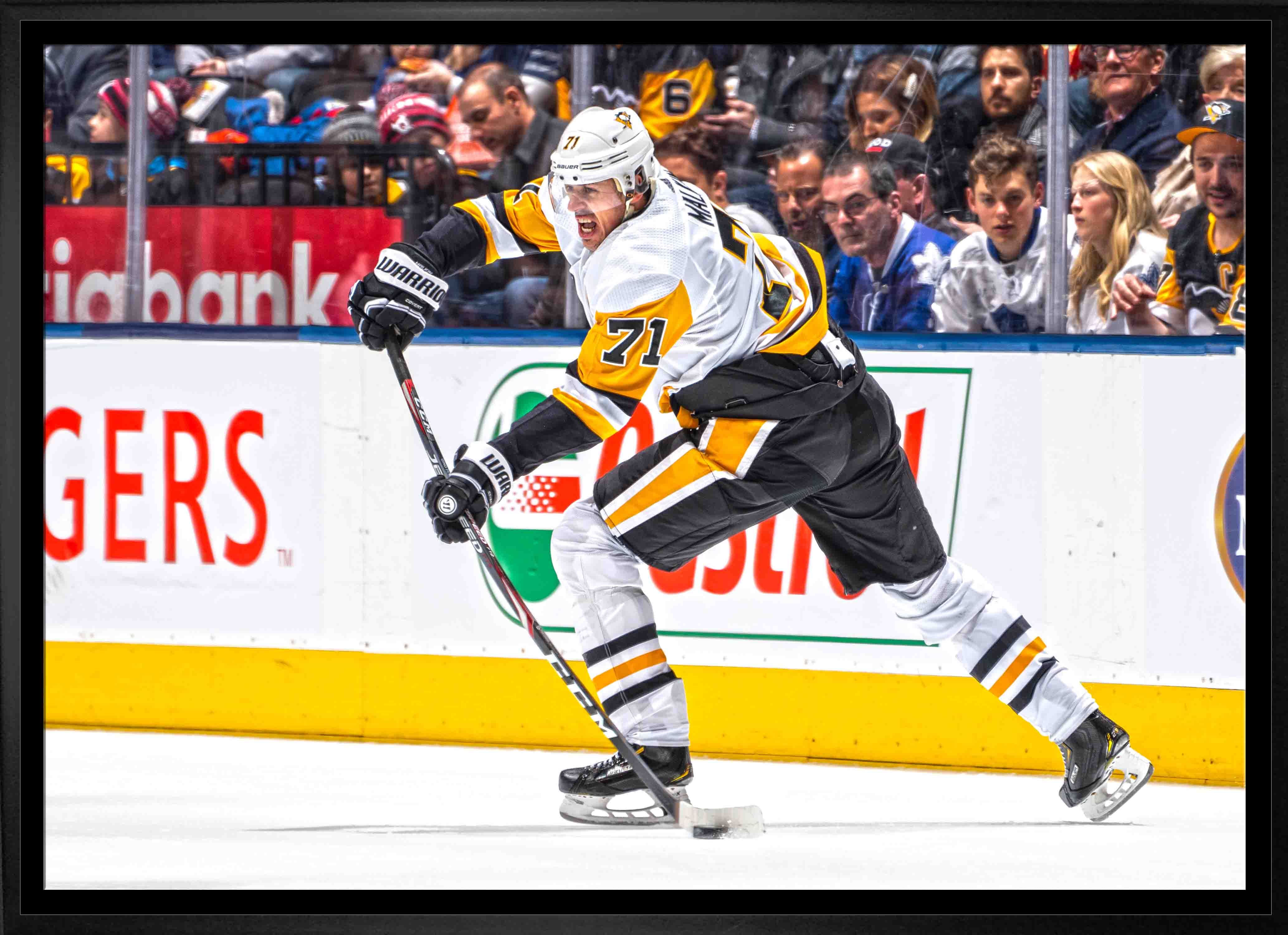 Evgeni Malkin Pittsburgh Penguins Framed 20" x 29" Passing Puck Canvas 31.5" x 22.5"