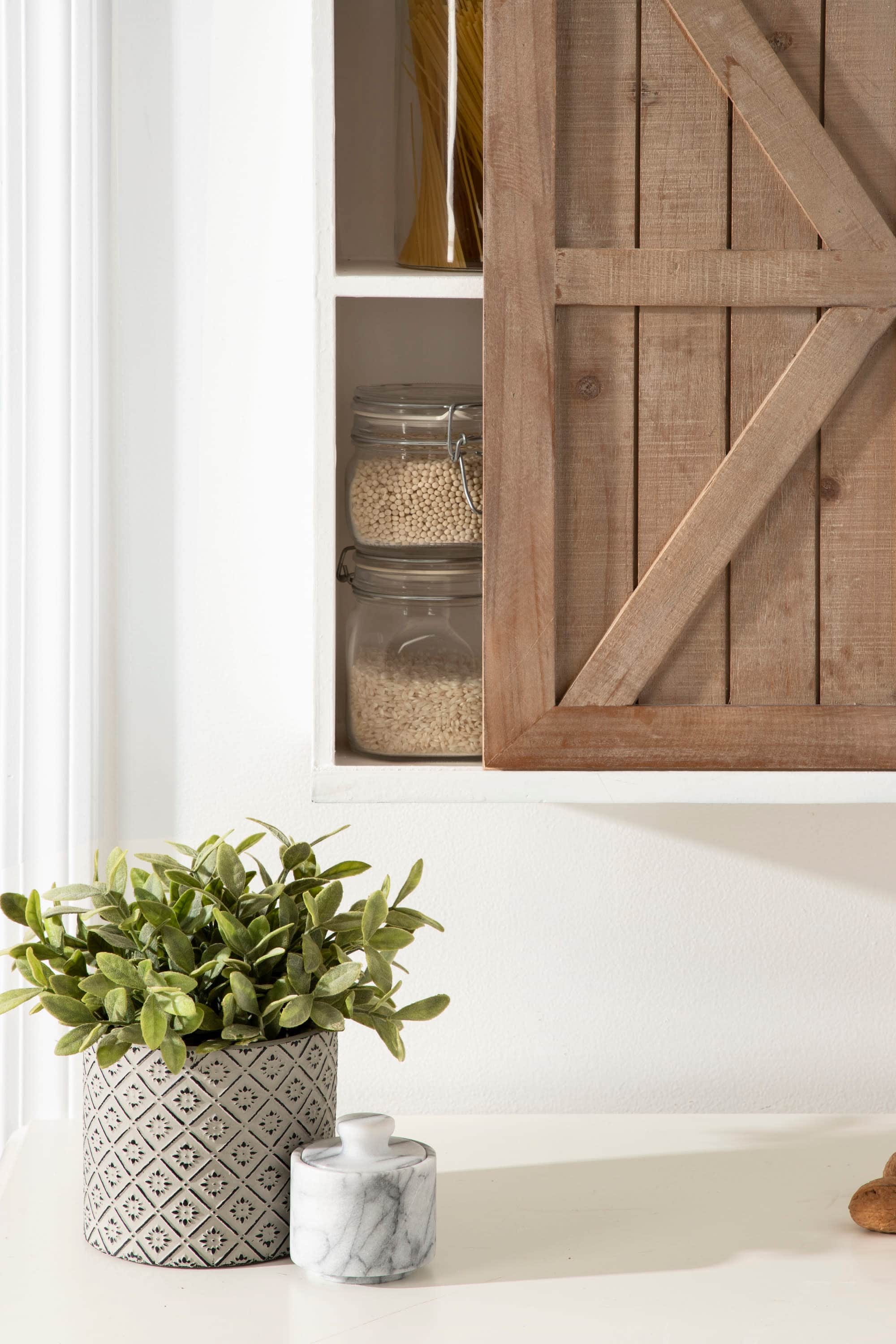 Kate and Laurel Cates Wood Wall Storage Cabinet with Sliding Barn Door