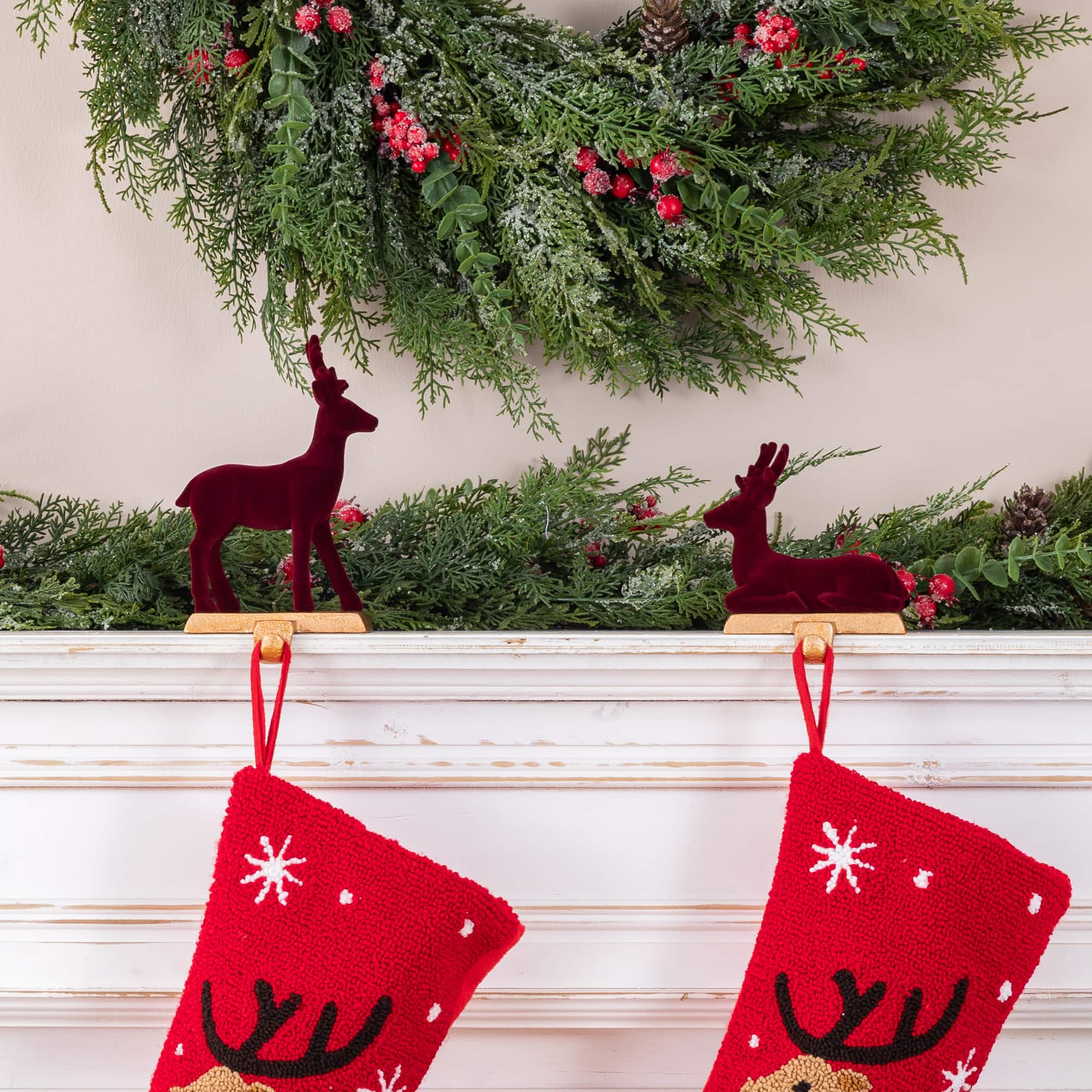 Glitzhome® Set of 2 Flocked Burgundy Resin Standing & Sitting Reindeer Stocking Holders