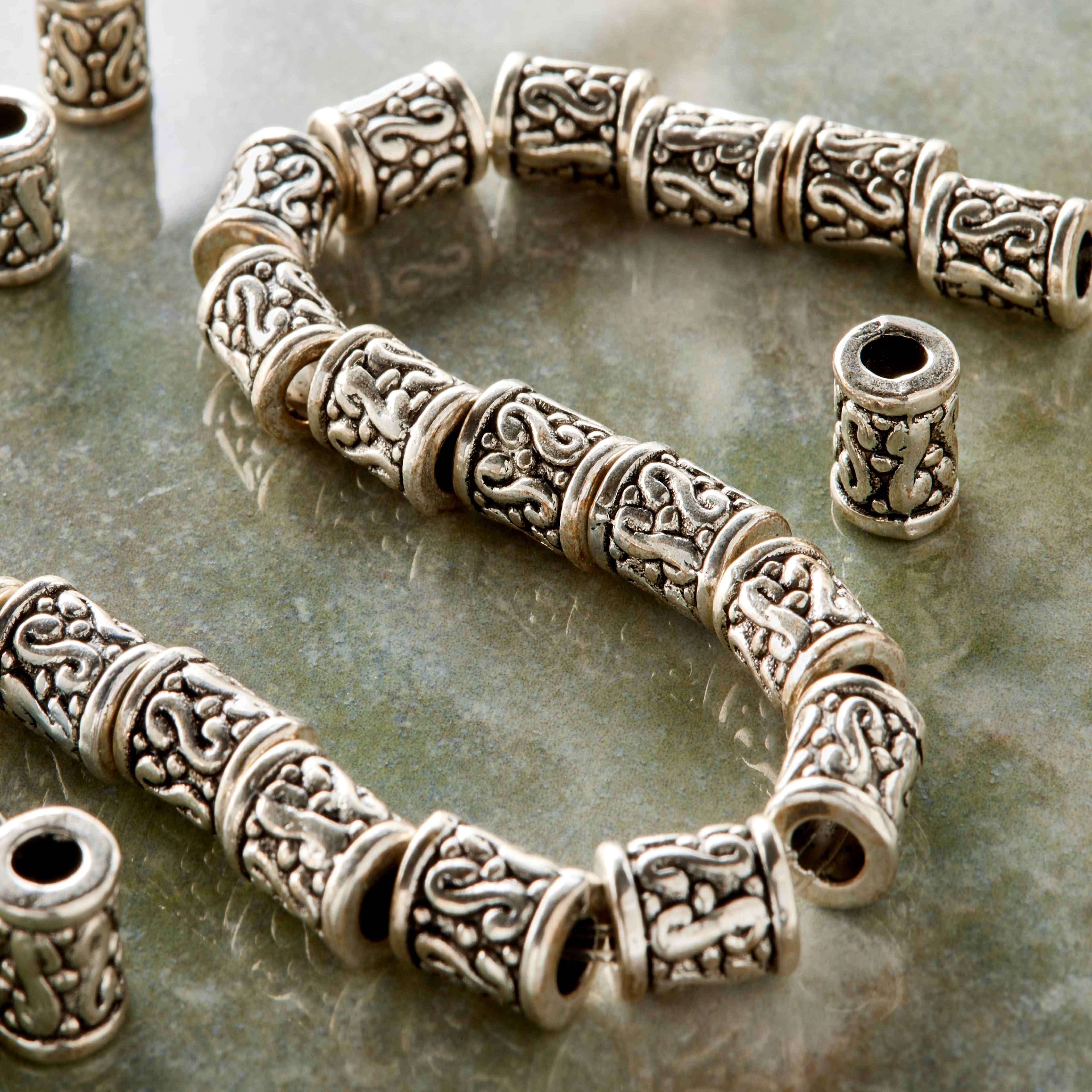 12 Pack:  Sterling Silver Plated Tube Beads, 9mm by Bead Landing™