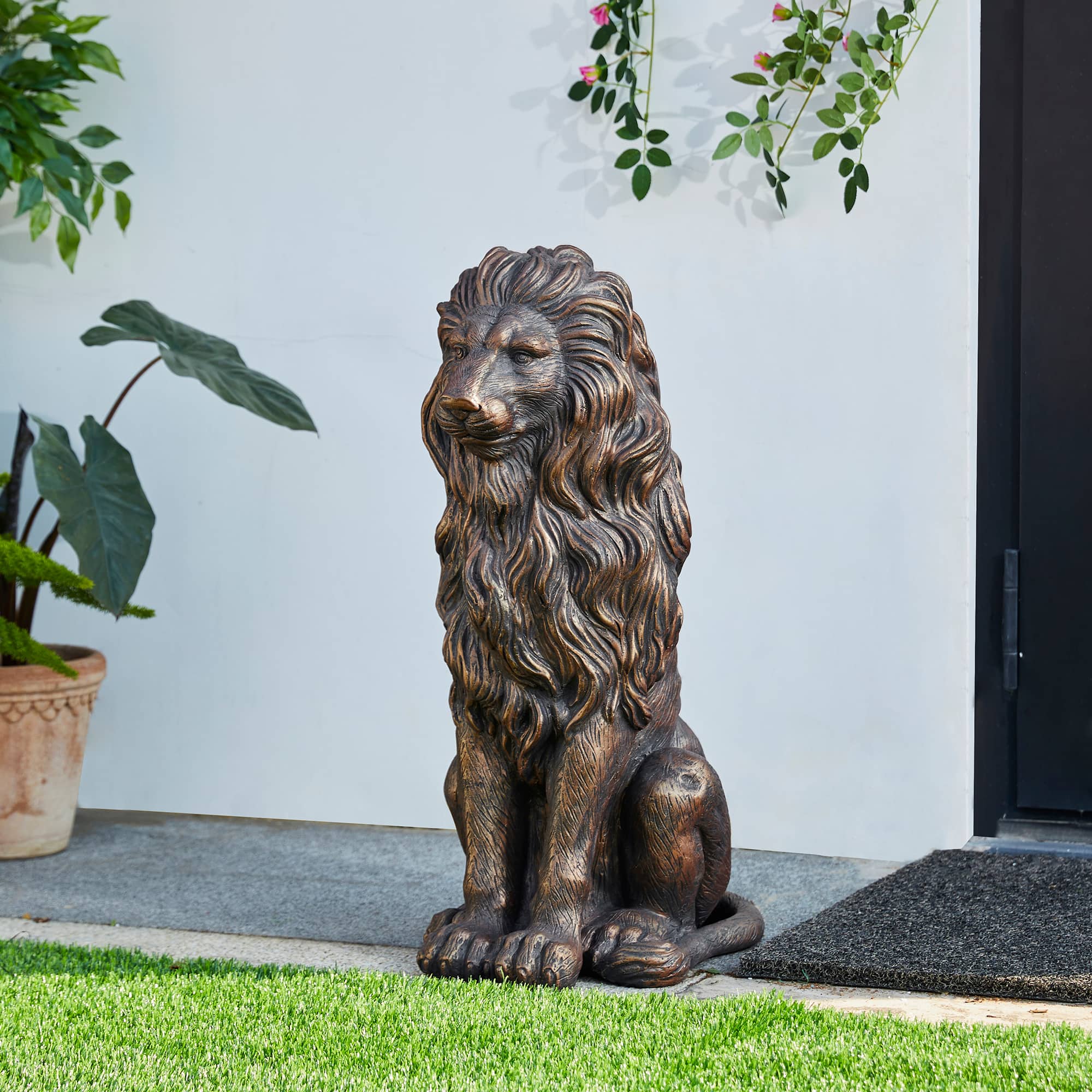 Glitzhome® 2ft. Oversized Bronze Sitting Lion Garden Statue