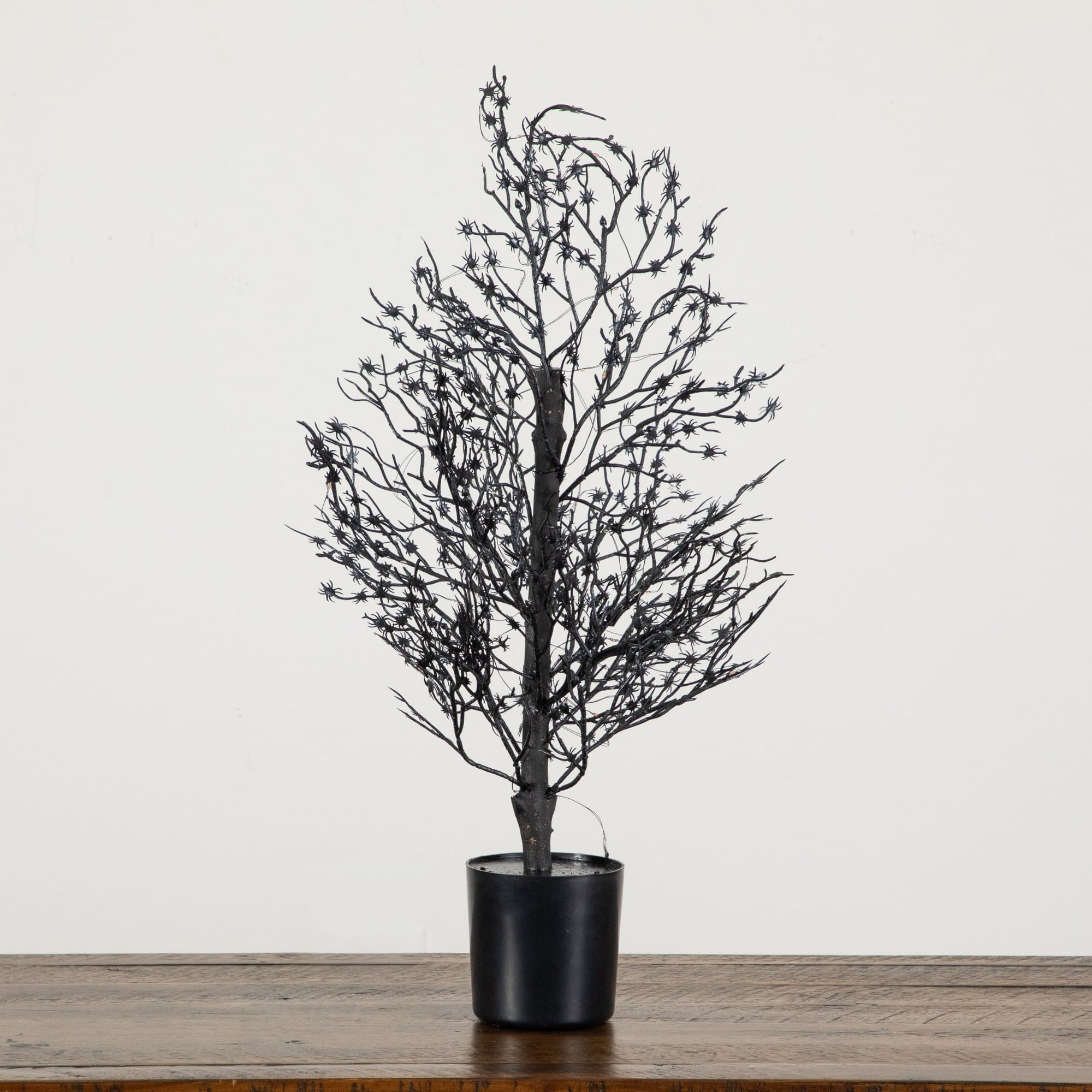 2ft. Pre-Lit Artificial Halloween Spider Twig Tree with 50 Orange & Purple LED Lights