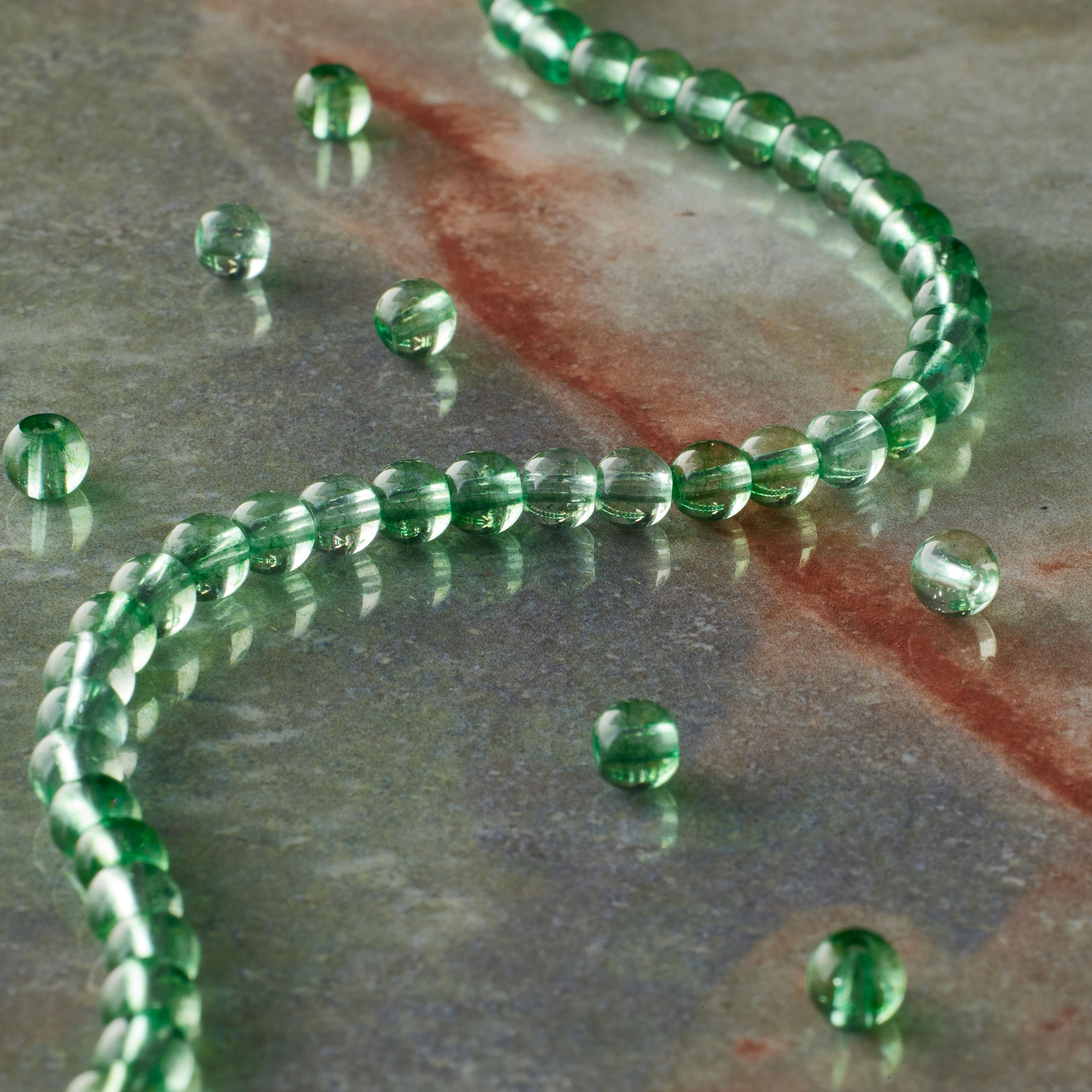 12 Pack: Light Green Quartz Round Beads by Bead Landing