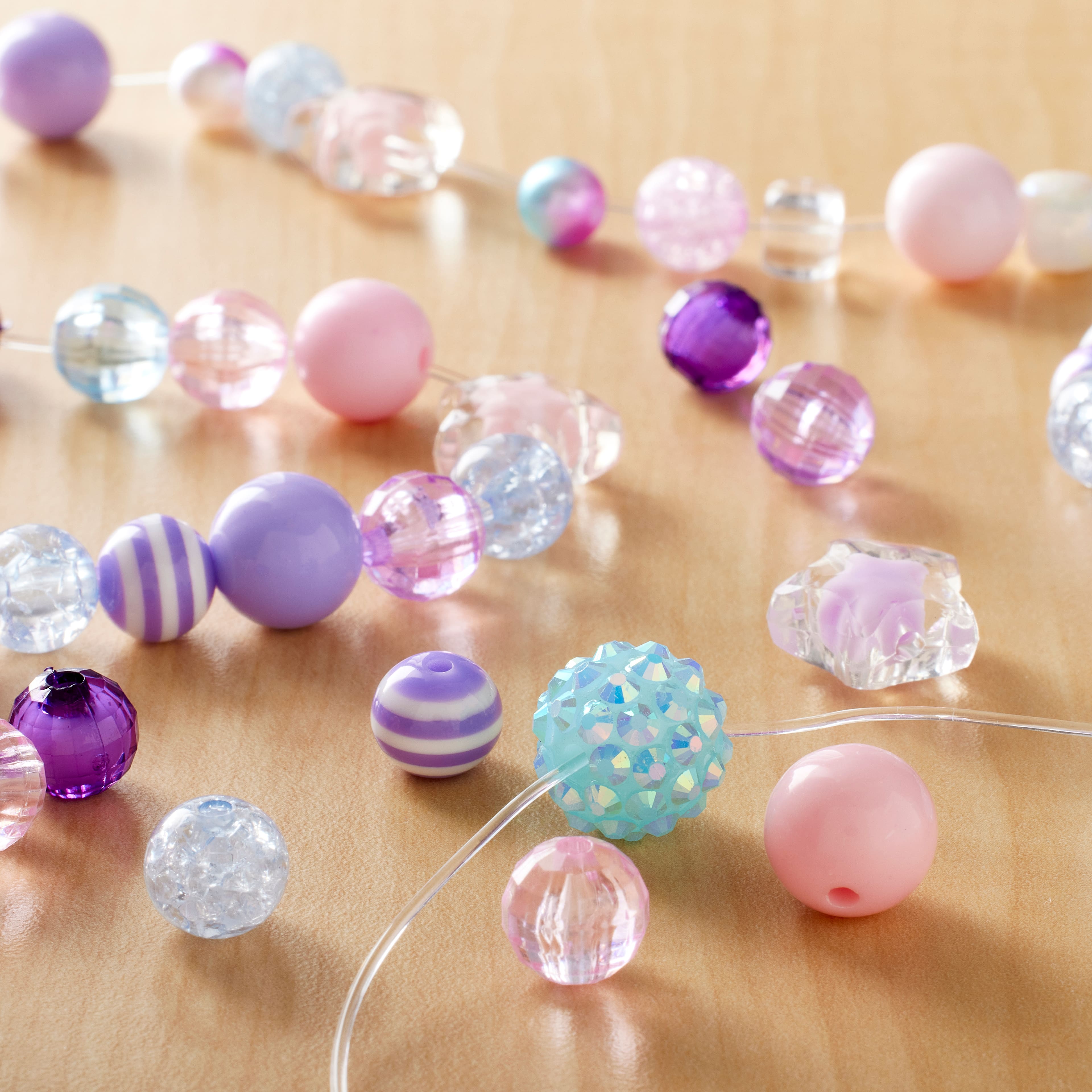 12 Pack: 1/2lb. Unicorn Mixed Shape Beads by Creatology™