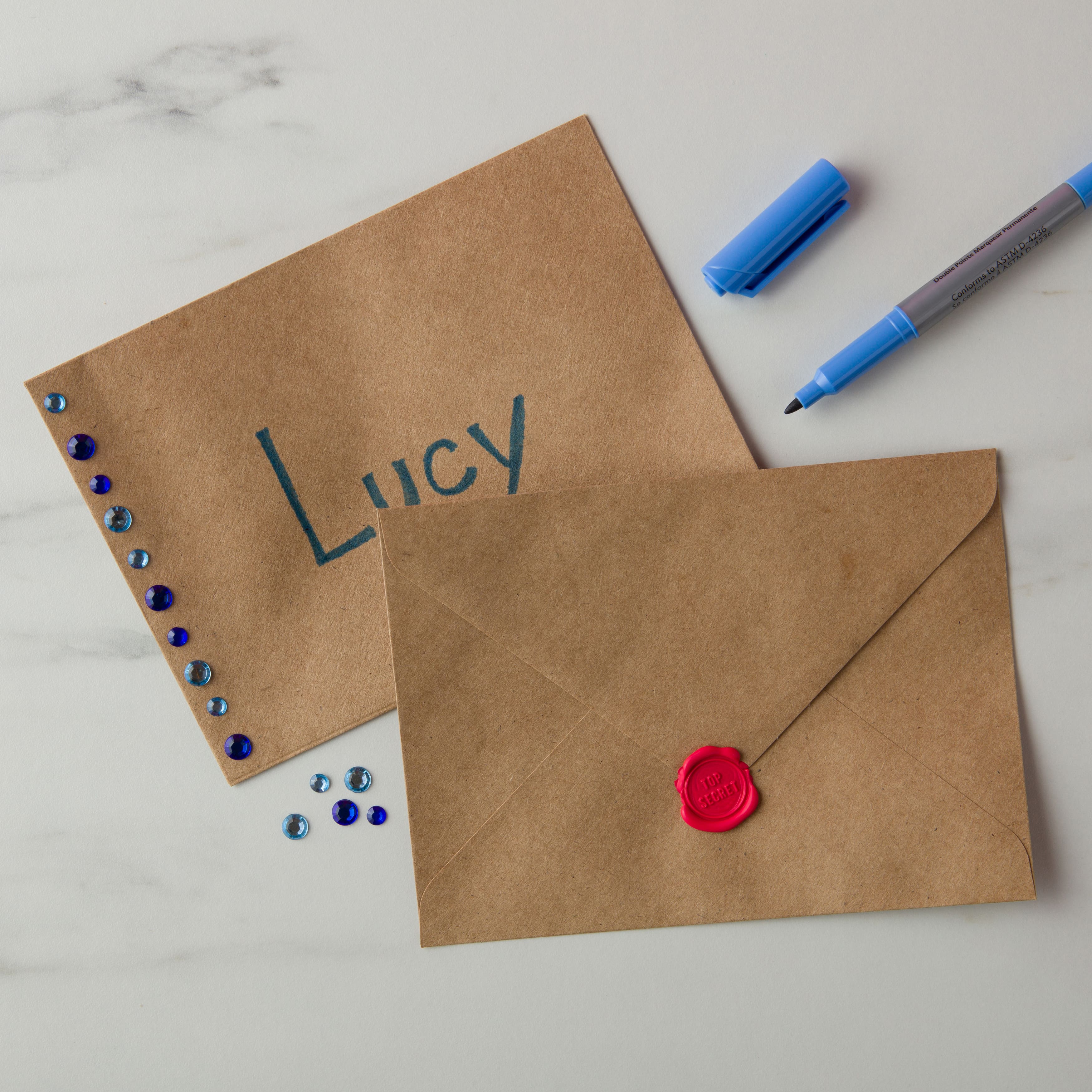 12 Packs: 50 ct. (600 total) 5.25" x 7.25" Kraft Envelopes by Recollections™