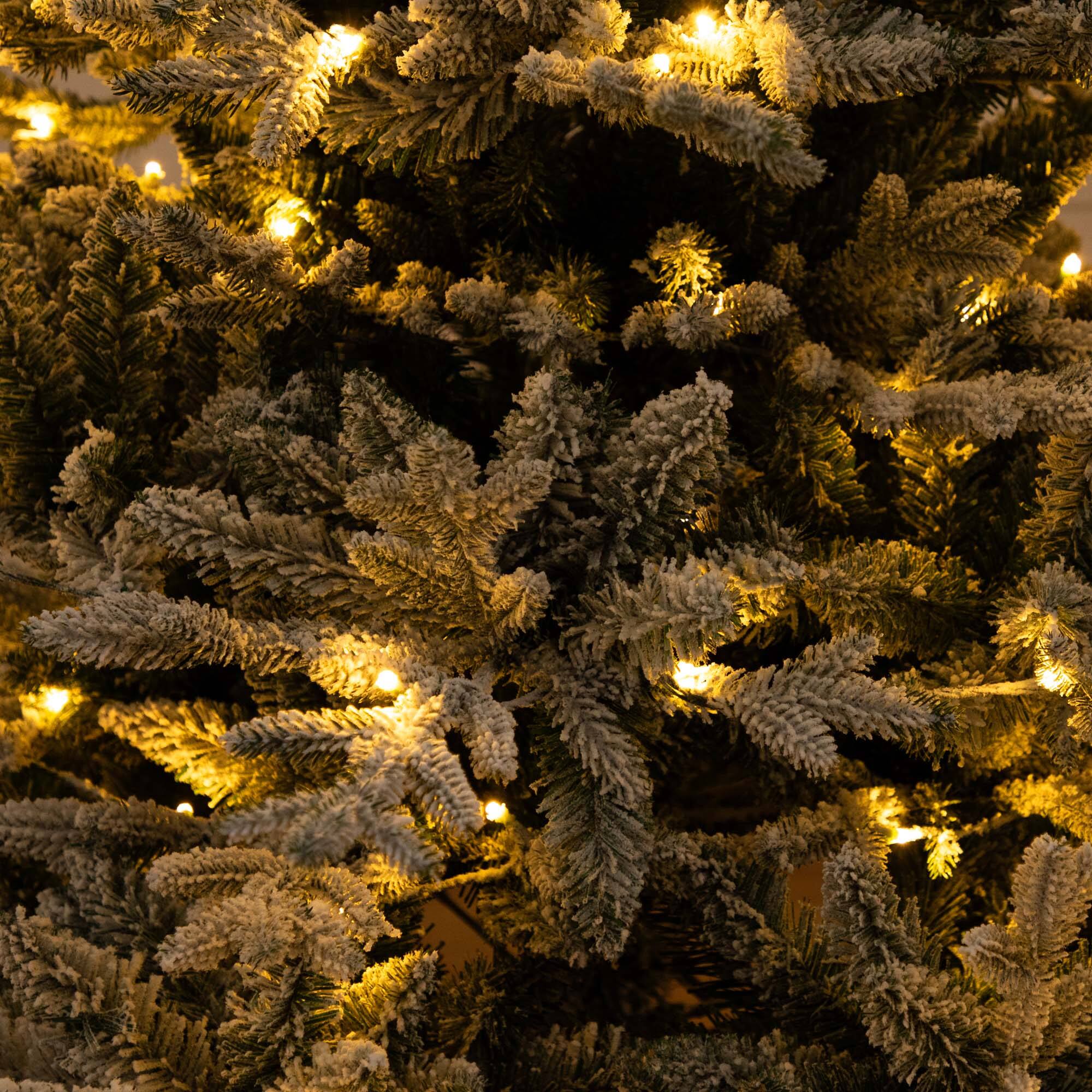 6ft. Pre-Lit Fraser Fir Flocked Artificial Christmas Tree with Instant, Warm White LED Lights