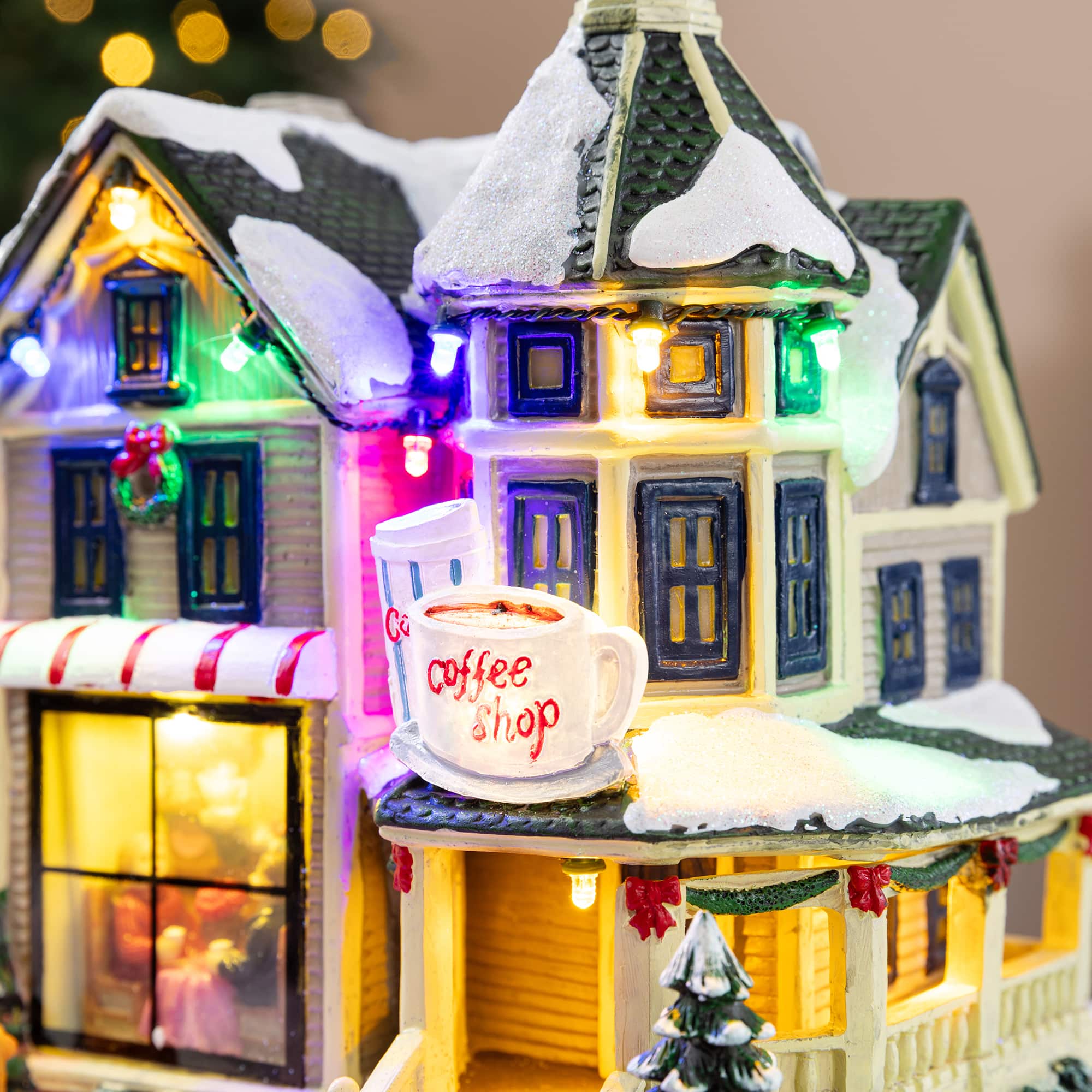 Glitzhome® 8.5" Lighted Christmas Coffee Shop Musical Resin Village with Timer