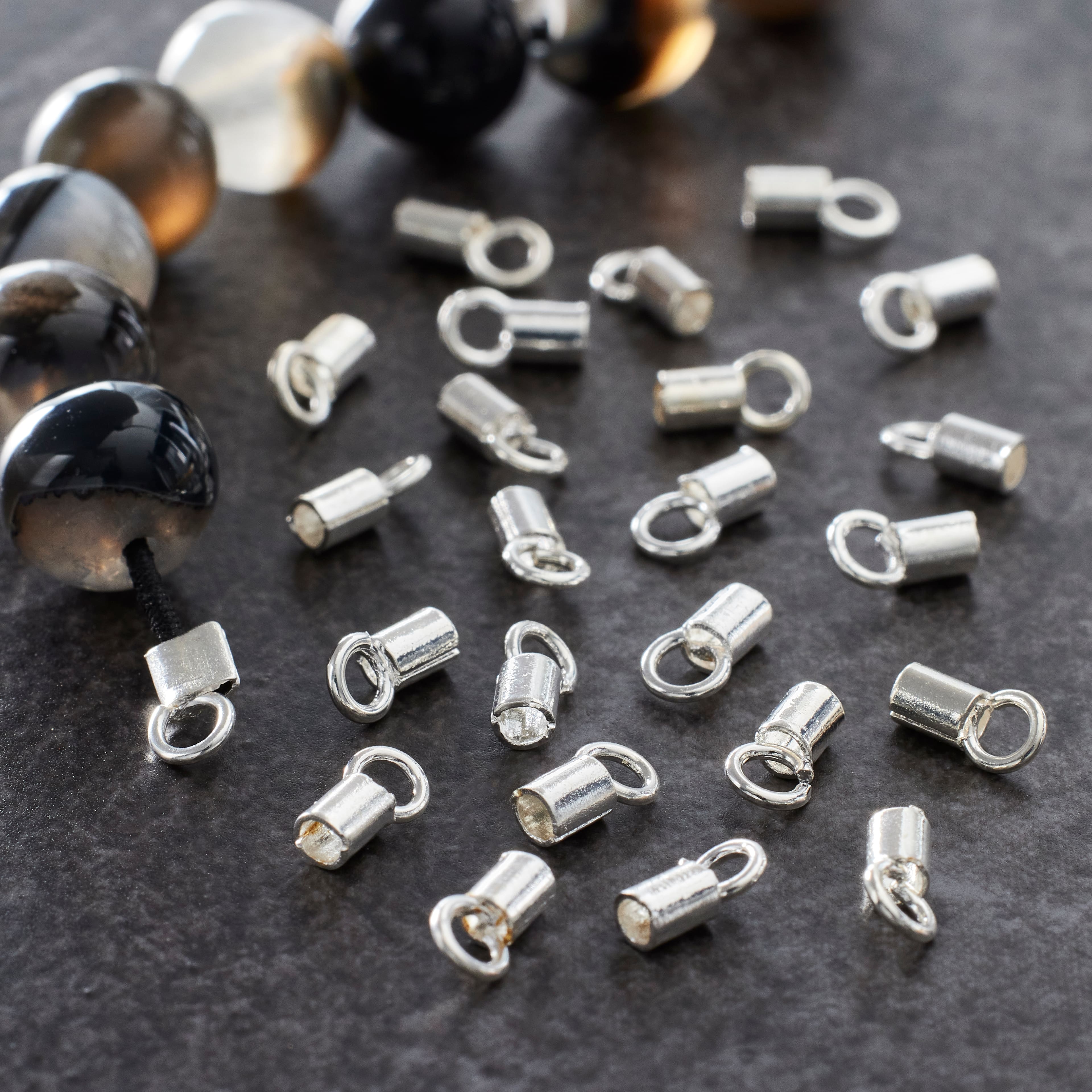 12 Packs: 26 ct. (312 total) 3mm Silver Crimp End Caps by Bead Landing™