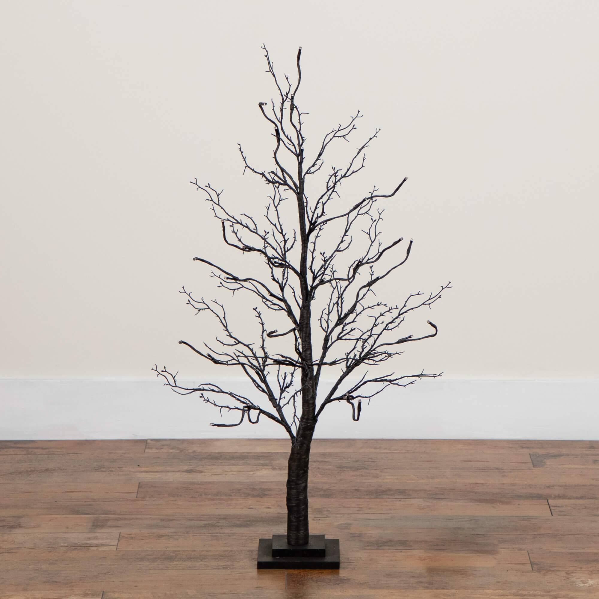 3ft. Pre-Lit Halloween Deluxe Black Twig Artificial Tree with 36 Orange & Purple LED Lights