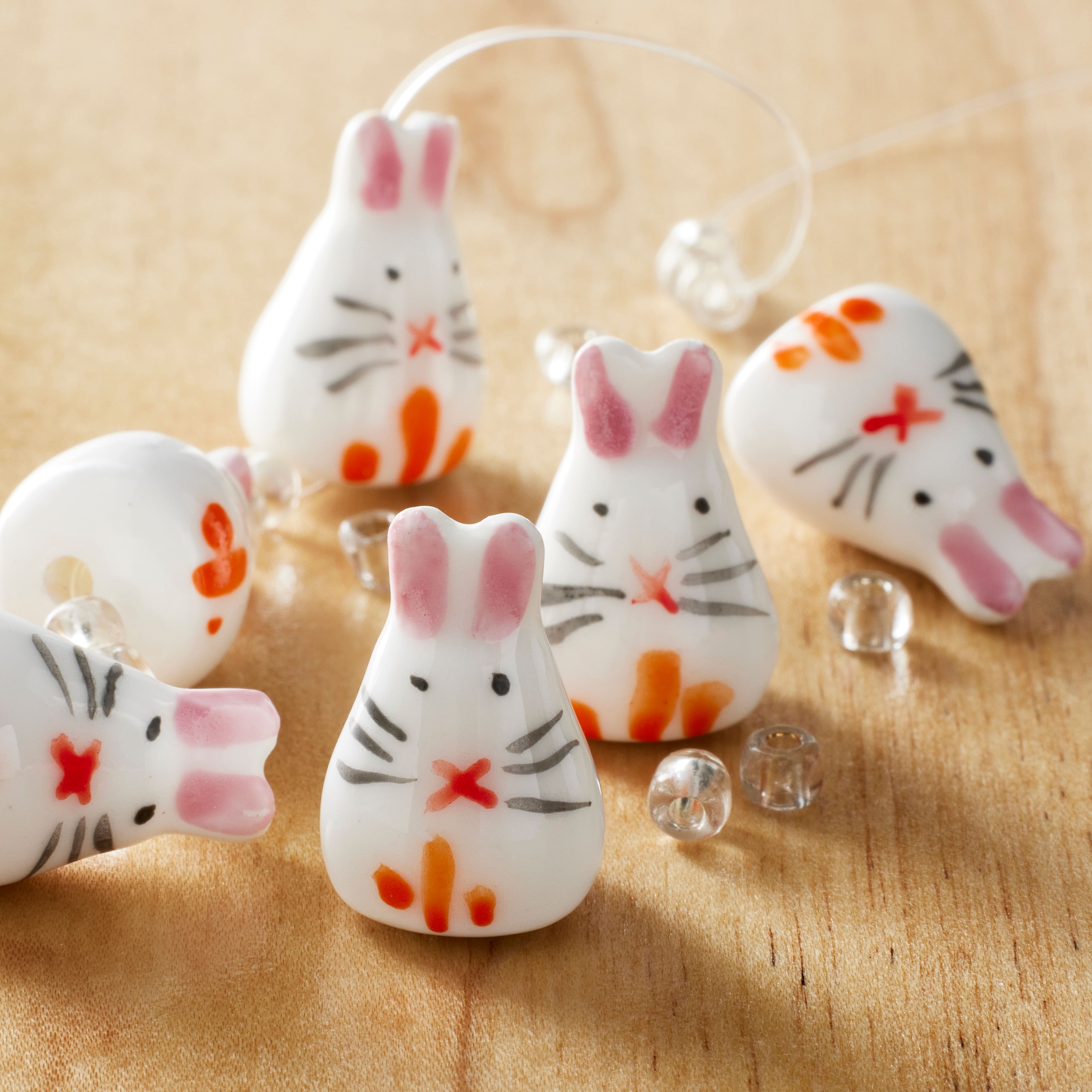 12 Pack: White Rabbit Ceramic Beads, 19mm by Bead Landing™