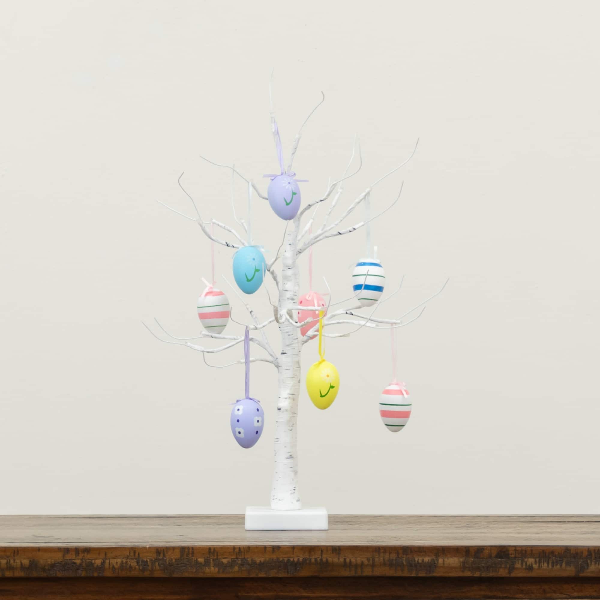 2ft. Pre-Lit Artificial Easter Twig Tree with Egg Ornaments and 24 Warm White LED Lights