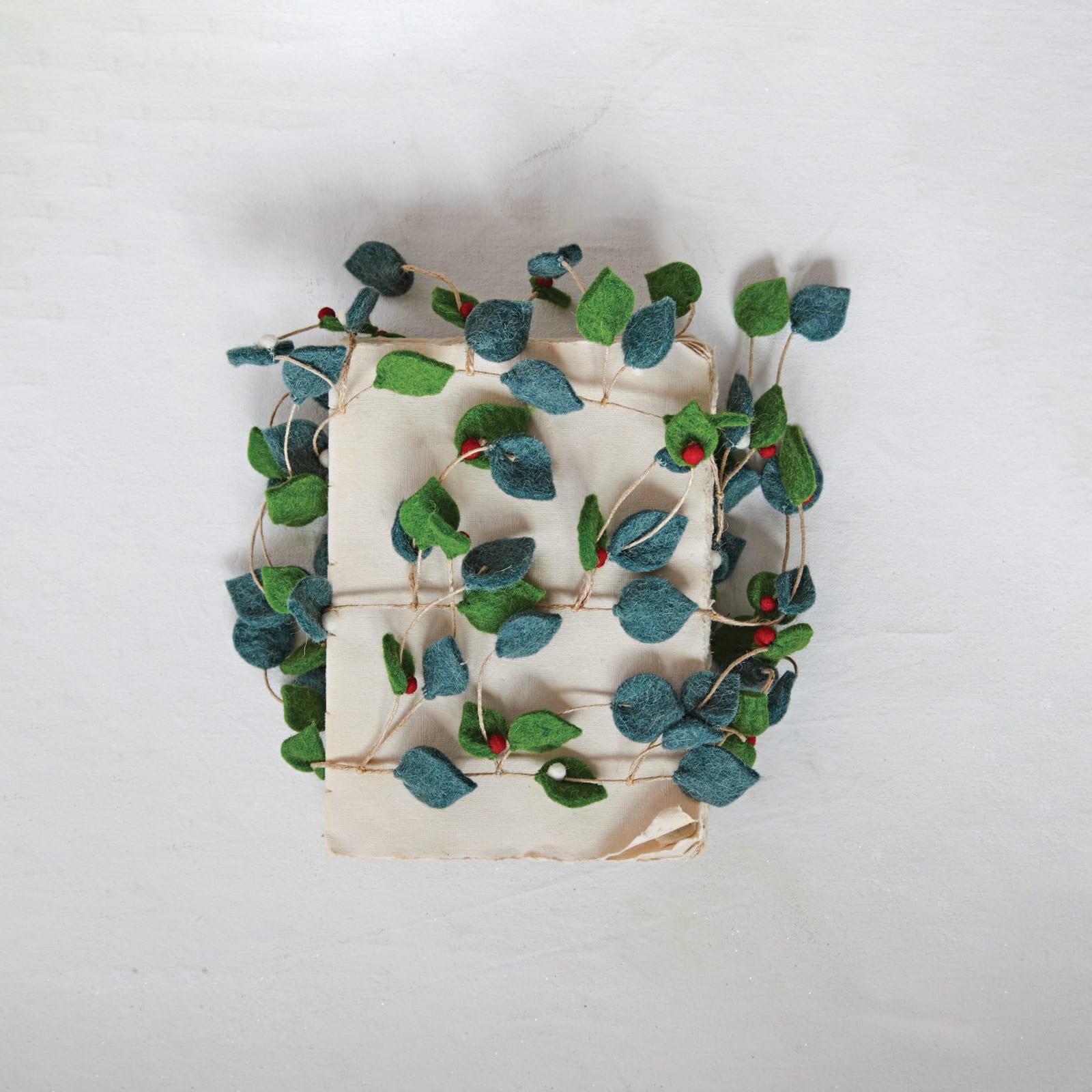 Hello Honey® 6ft. Green Leaves & Berries Handmade Felt Garland