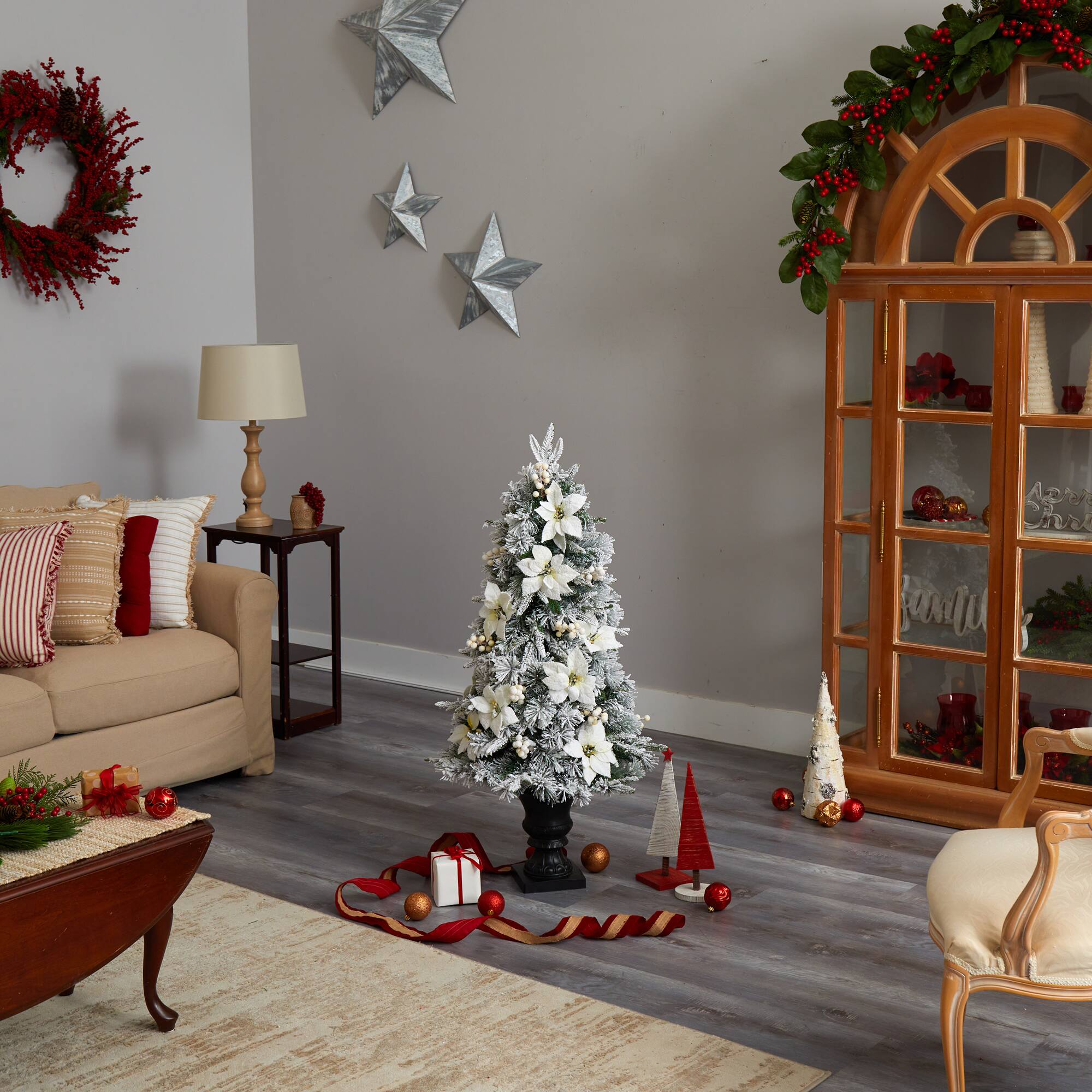 4ft. Pre-Lit Flocked Artificial Christmas Tree in Decorative Urn, Warm White Lights