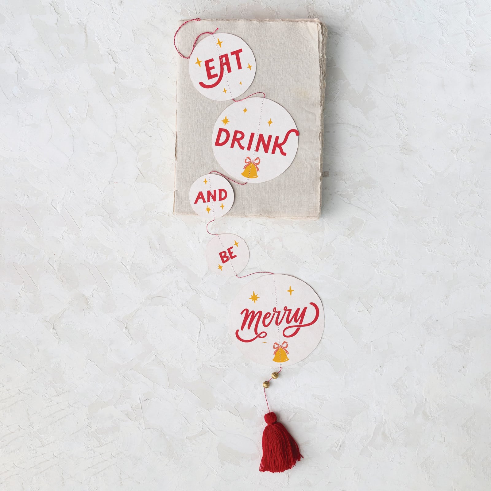 Hello Honey® 3ft. Eat Drink & Be Merry Handmade Recycled Paper Banner with Beaded Tassel