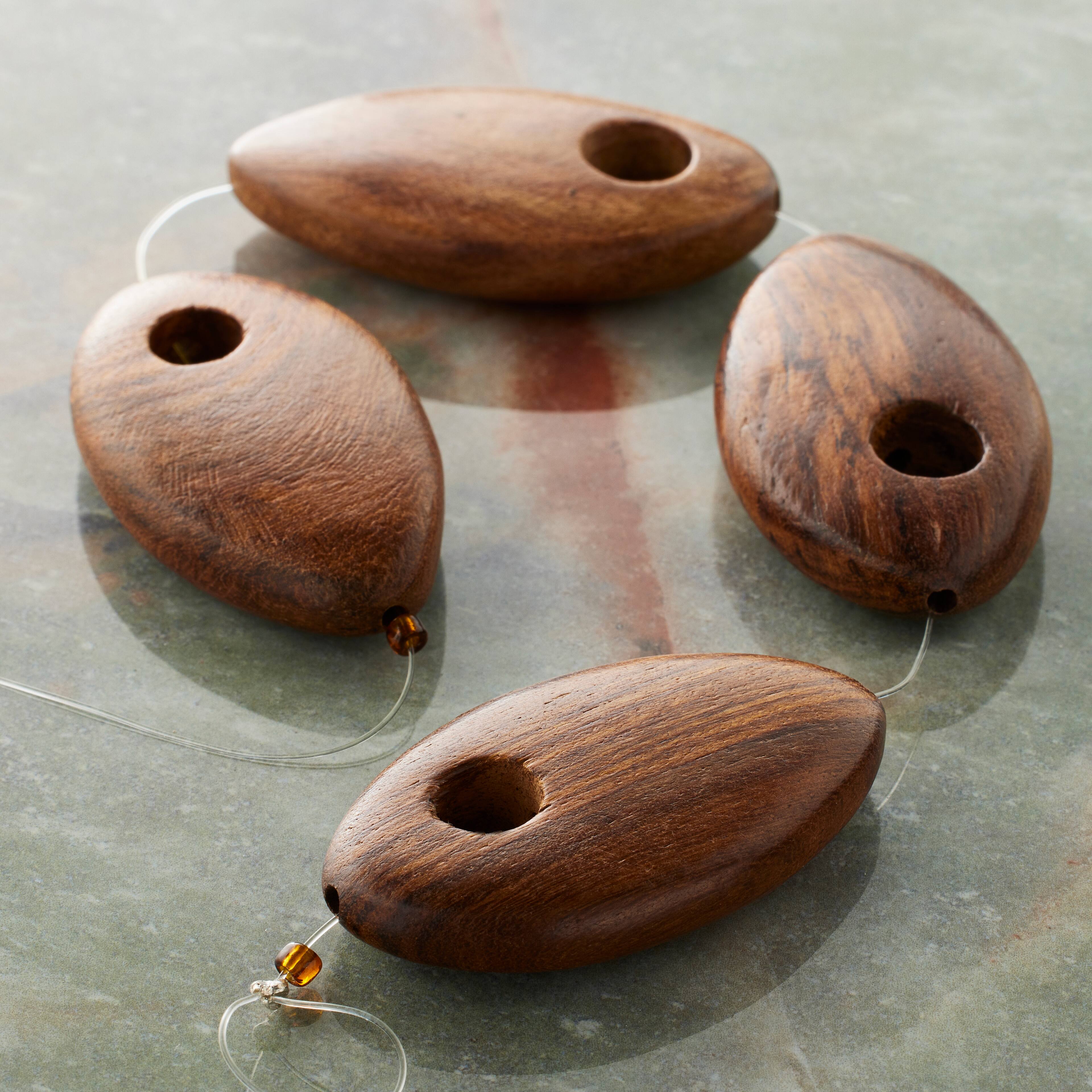 12 Packs: 4 ct. (48 total) Brown Wood Teardrop Beads by Bead Landing®