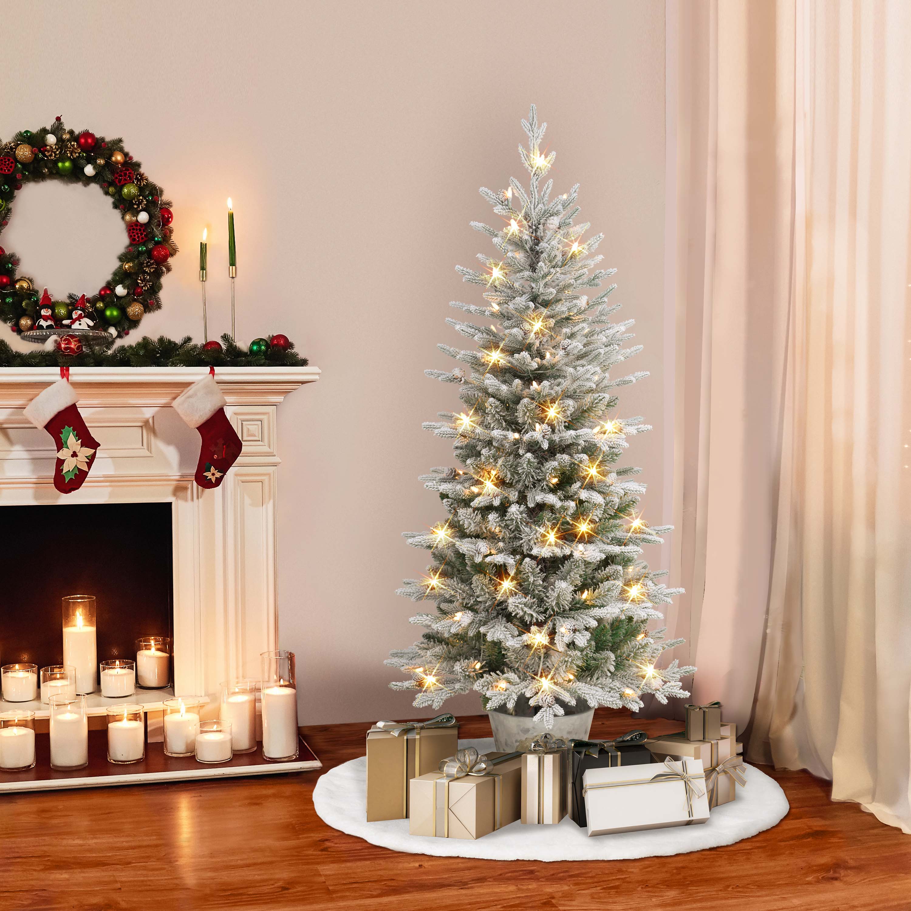 6ft. Pre-Lit Flocked Artificial Christmas Tree in Metal Planter, Clear Lights