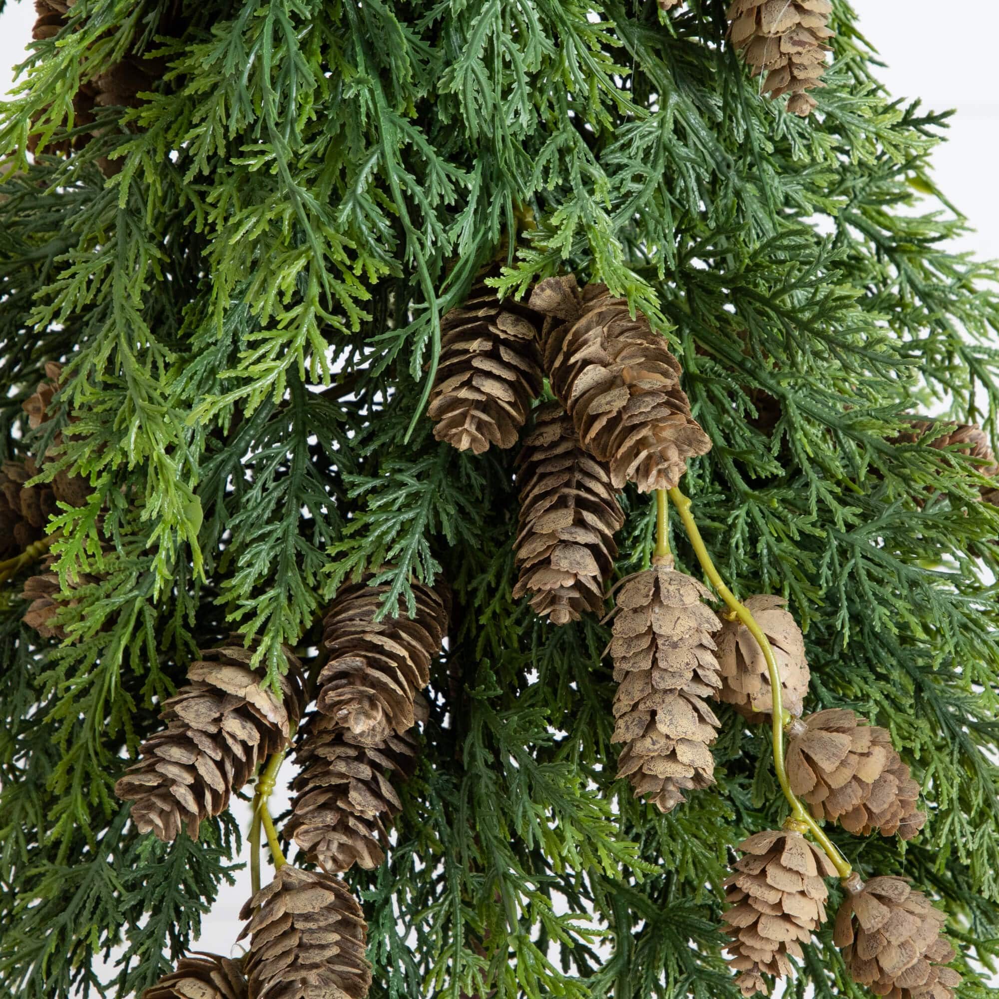 2ft. Artificial Down Swept Cedar Christmas Tree with Pinecones in Rustic Decorative Planter