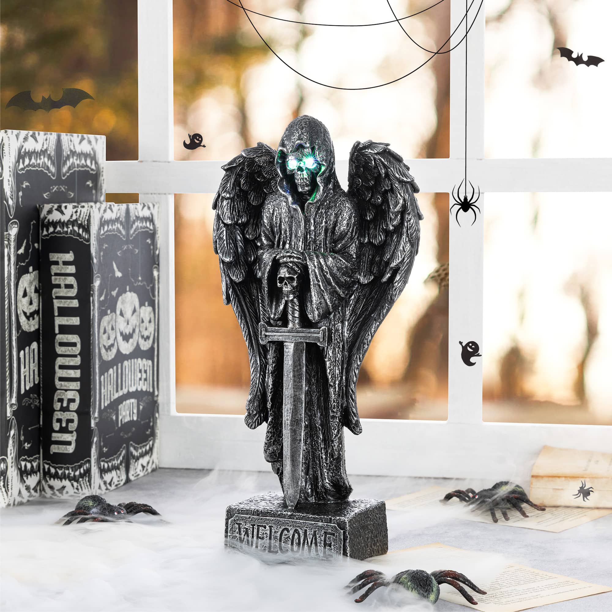 Glitzhome® 12" Halloween Lighted Resin Grim Reaper Table Decor with Timer