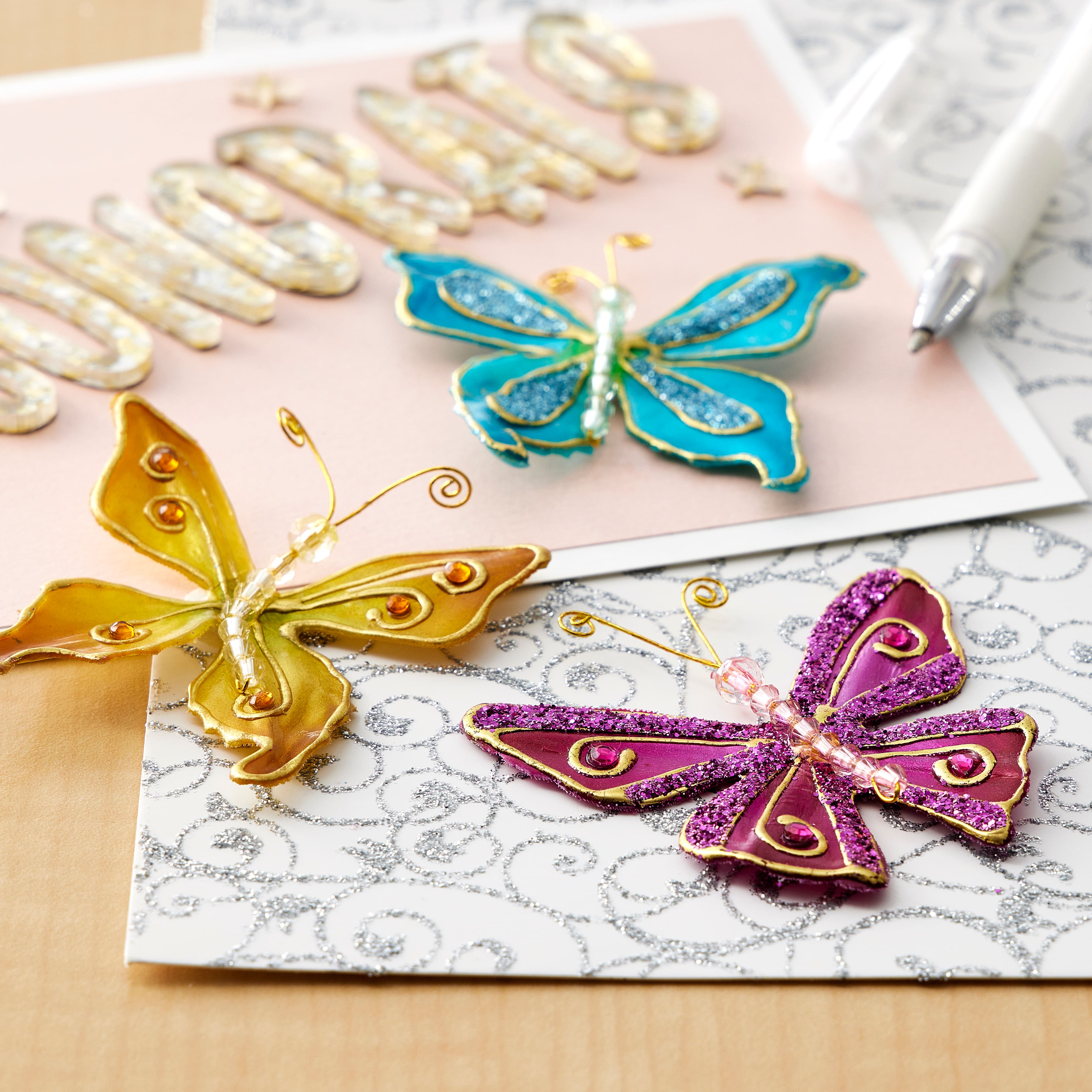 12 Packs: 4 ct. (48 total) Glacee Butterfly Embellishments by Recollections™