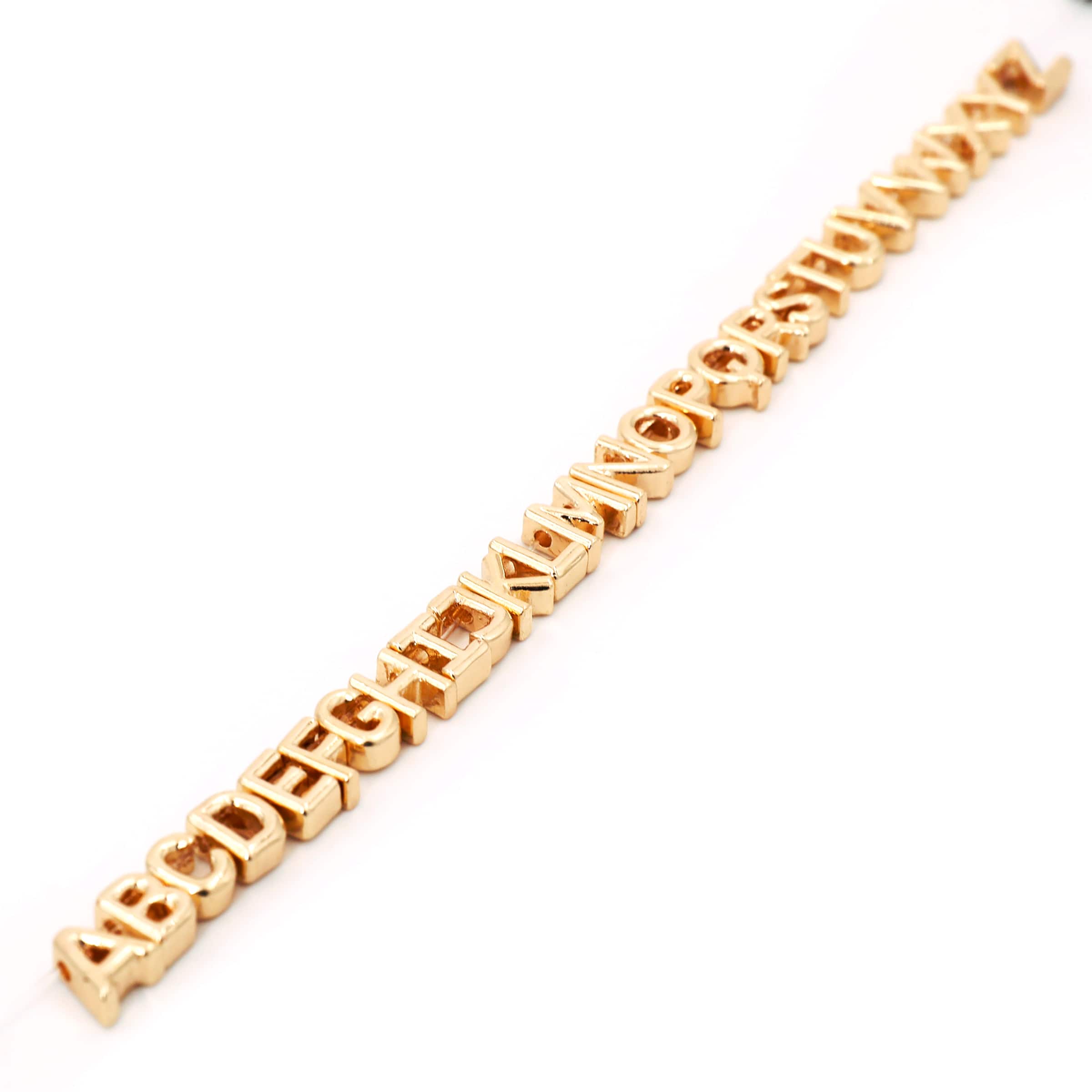 7.5mm Gold Metal Alphabet Beads, 26ct. by Bead Landing™