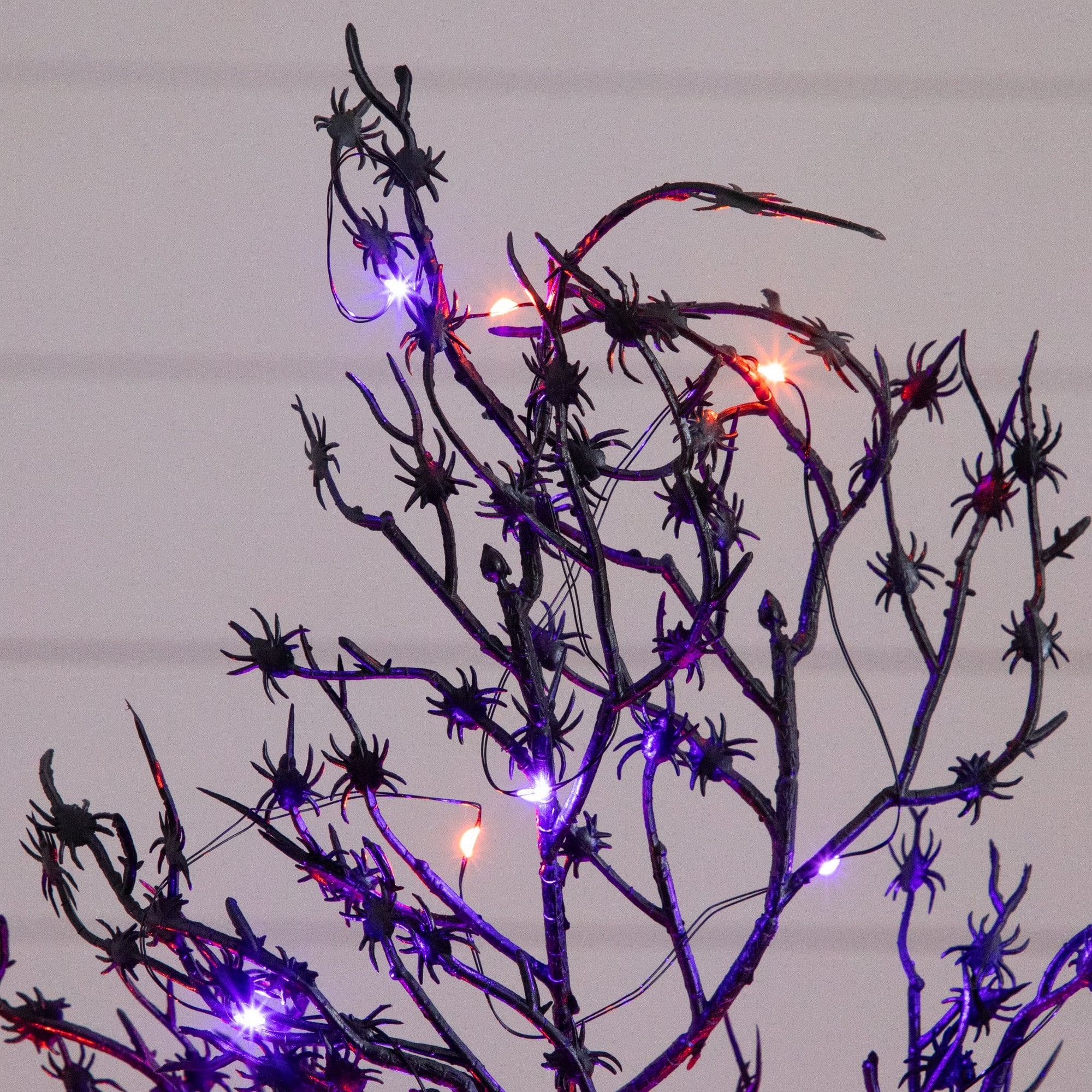 2ft. Pre-Lit Artificial Halloween Spider Twig Tree with 50 Orange & Purple LED Lights