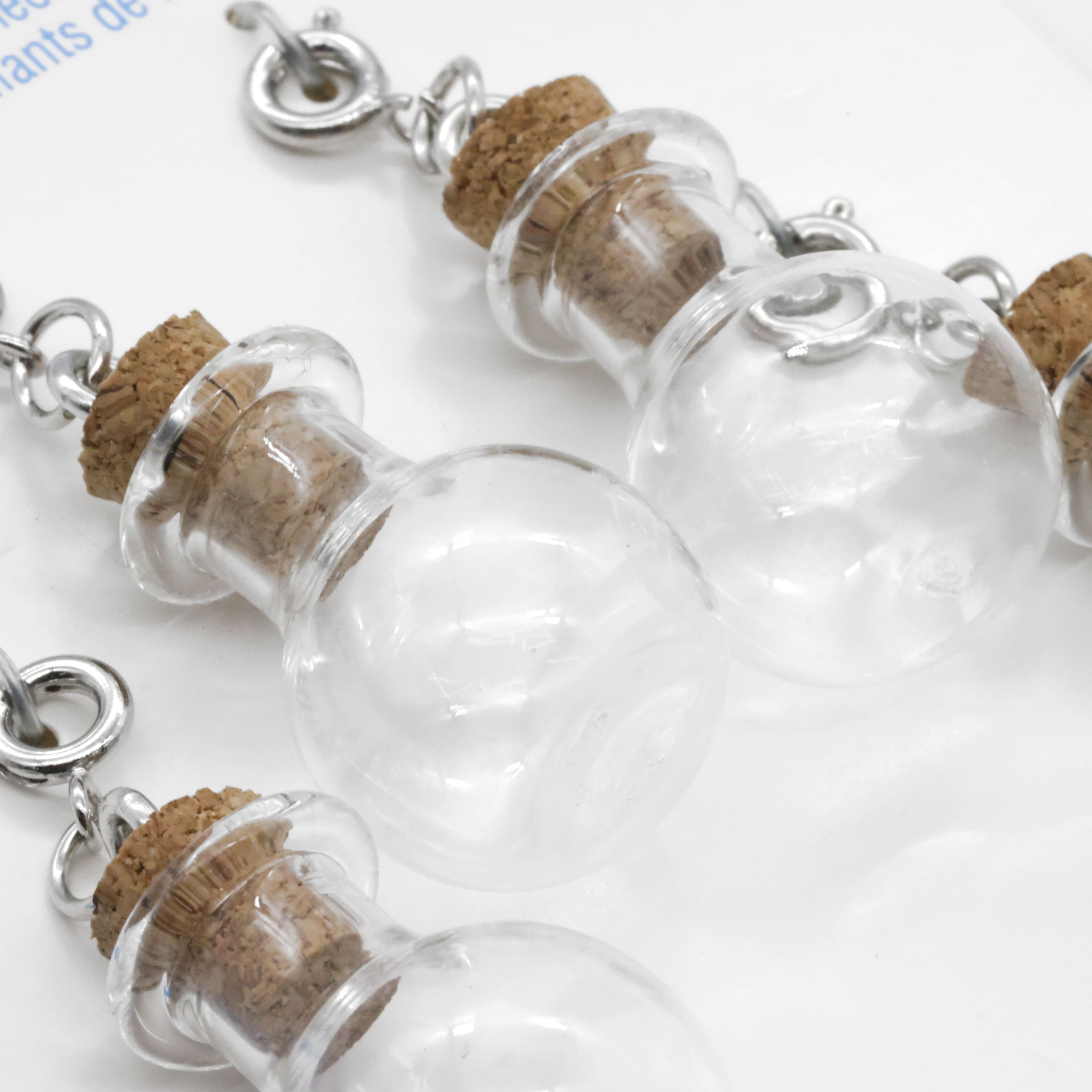 12 Packs: 4 ct. (48 total) Clear Potion Bottle Charms by Creatology™