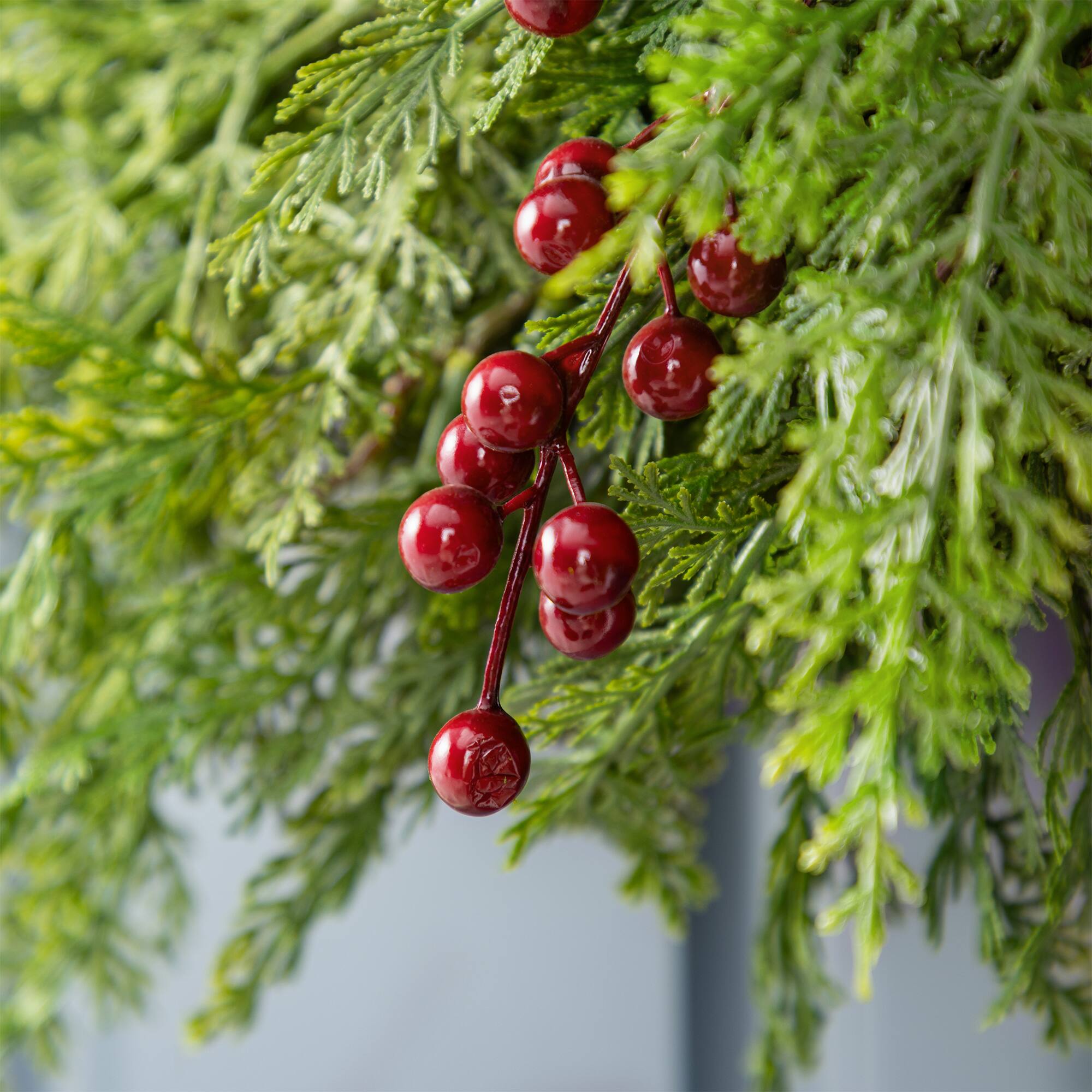 Glitzhome® 24"D Christmas Greenery PE Cedar Wreath with Red Berries