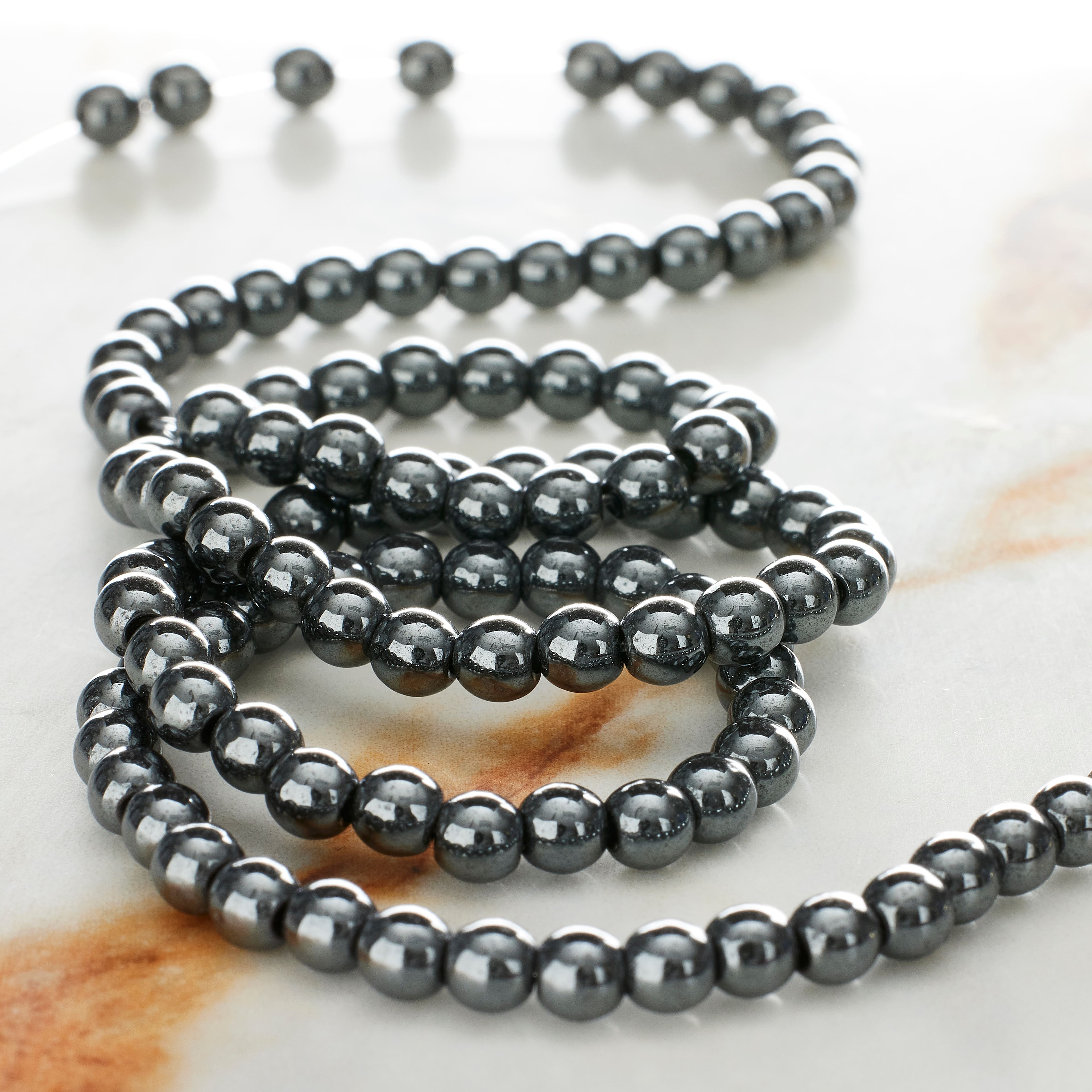 12 Pack: Gray Hematite Round Beads, 4mm by Bead Landing™