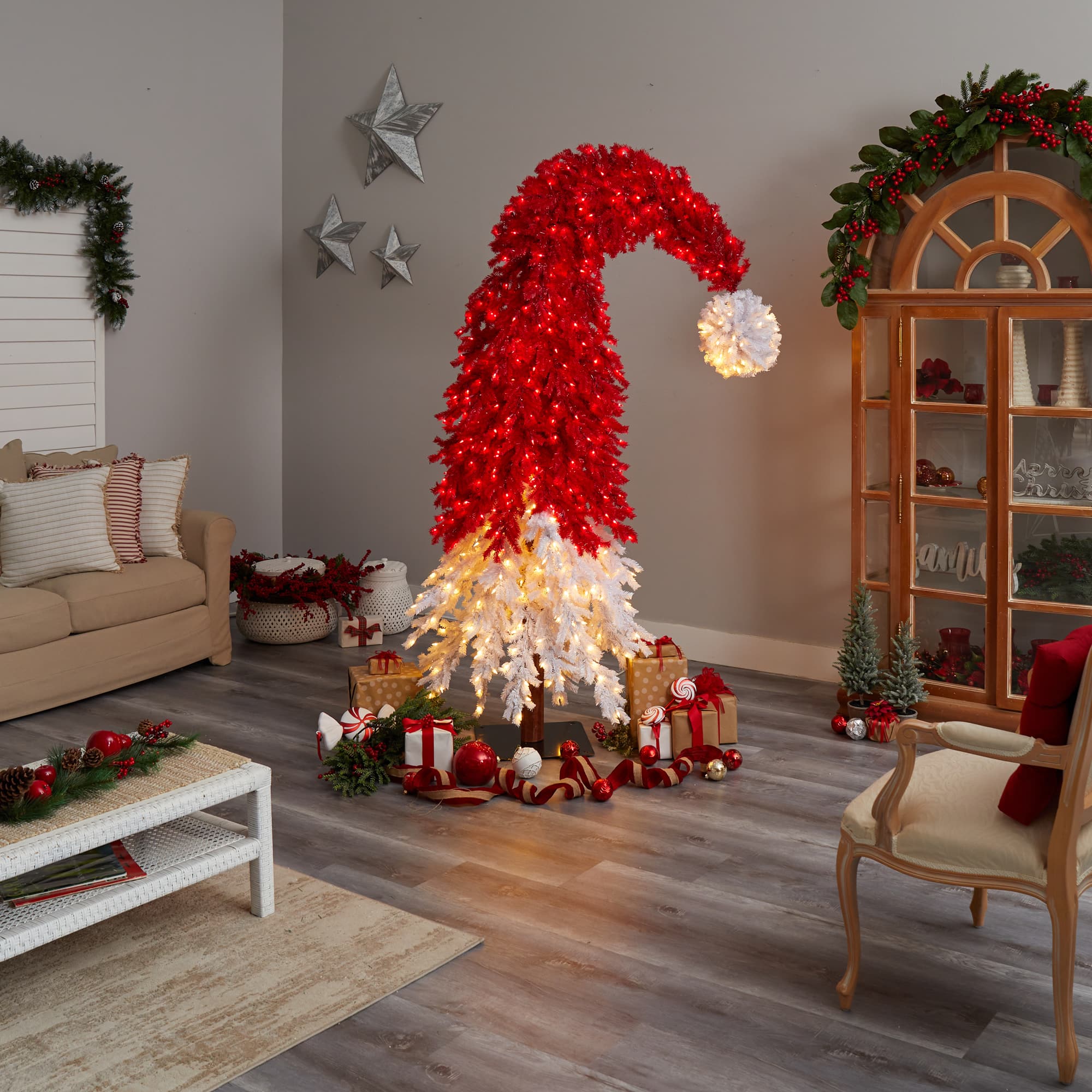 9ft. Pre-Lit Holiday Red Santa Hat Artificial Christmas Tree, White LED Lights